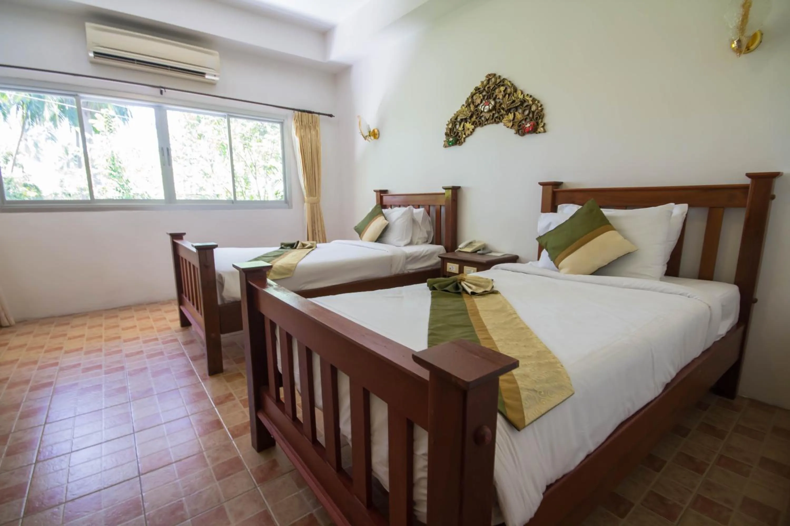 Bed in Rajapruek Samui Resort - SHA Plus