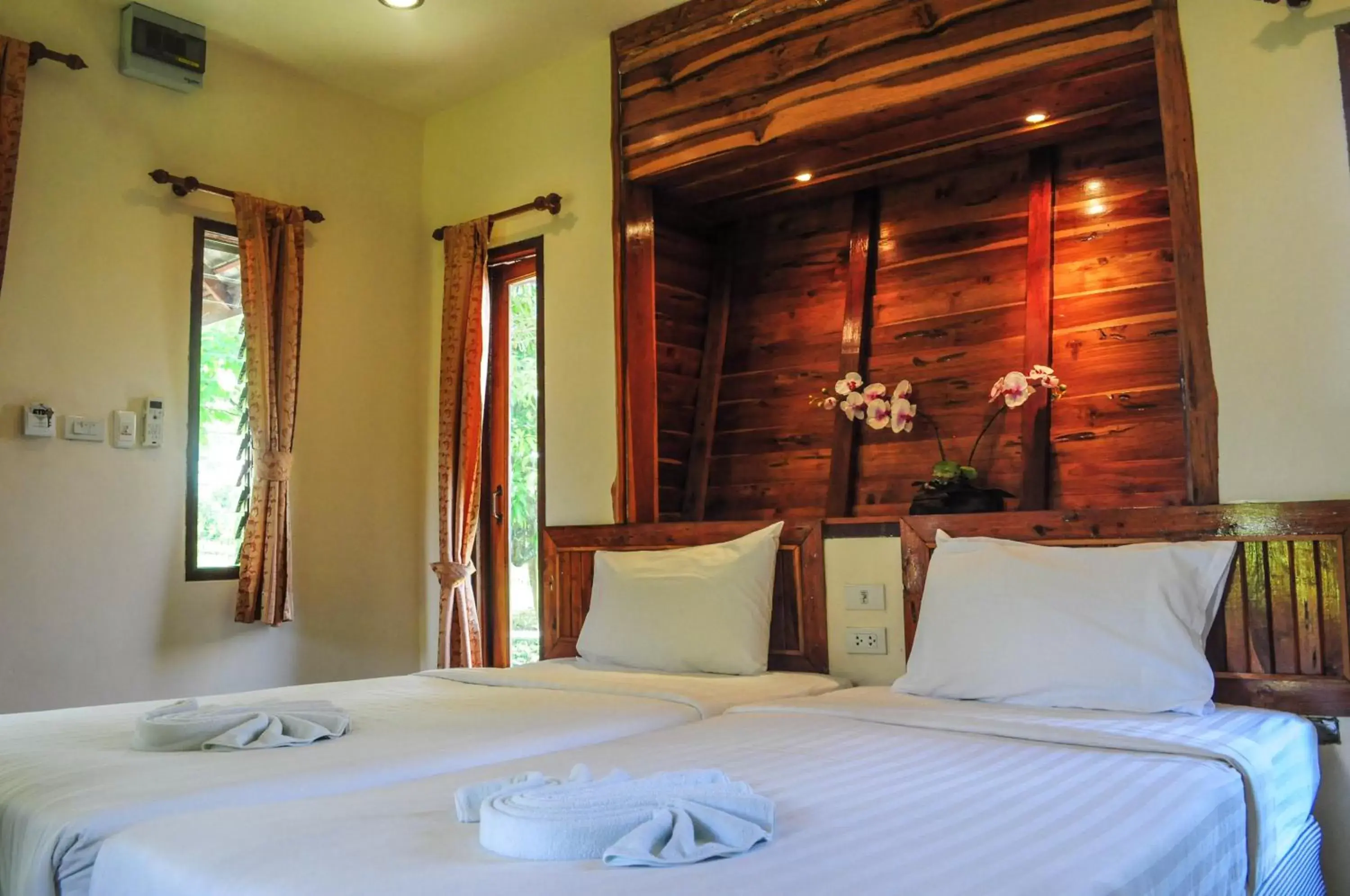 Bed in Pai Iyara Resort