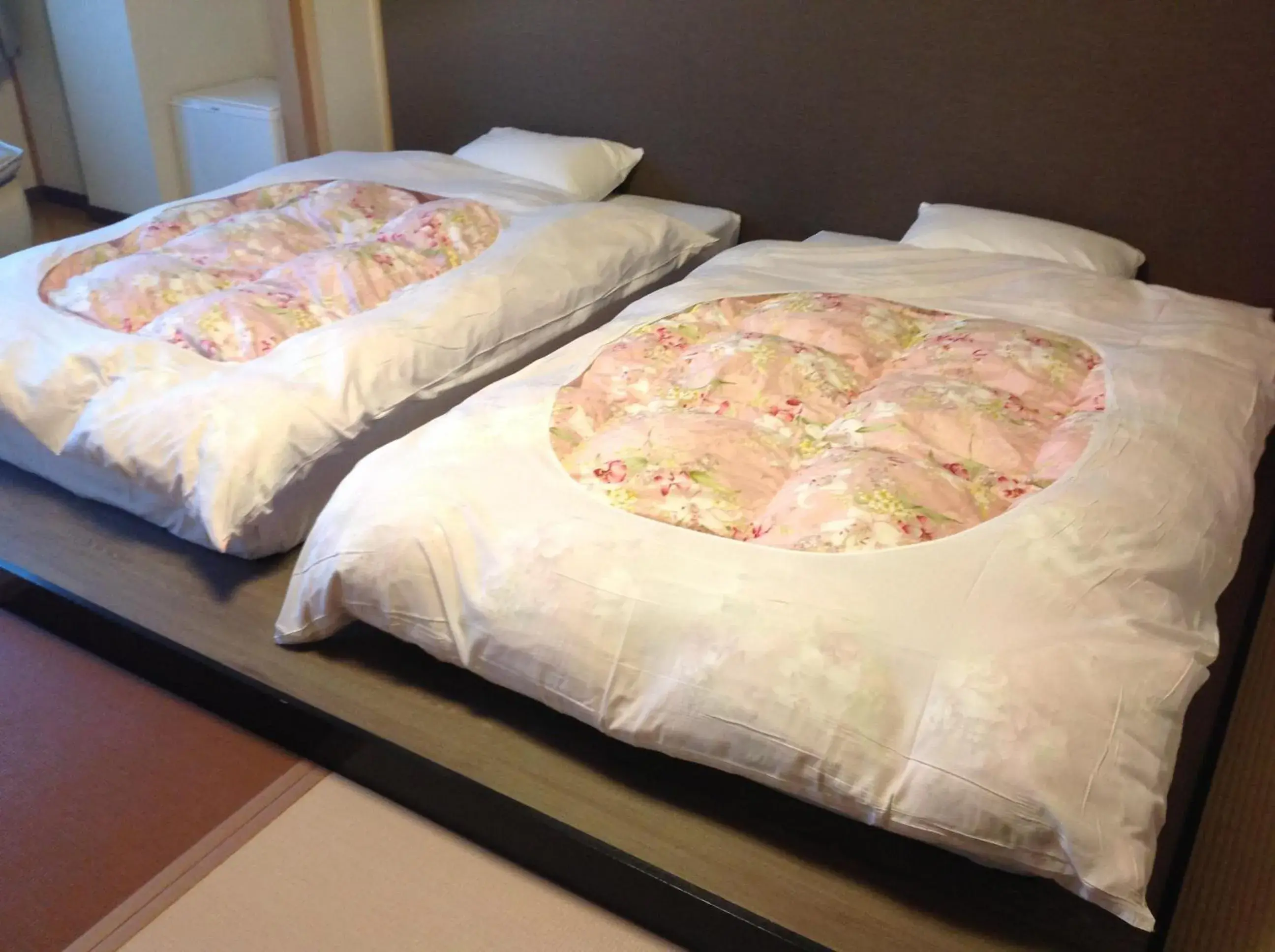 Bed in Granvillage Toya Daiwa Ryokan Annex