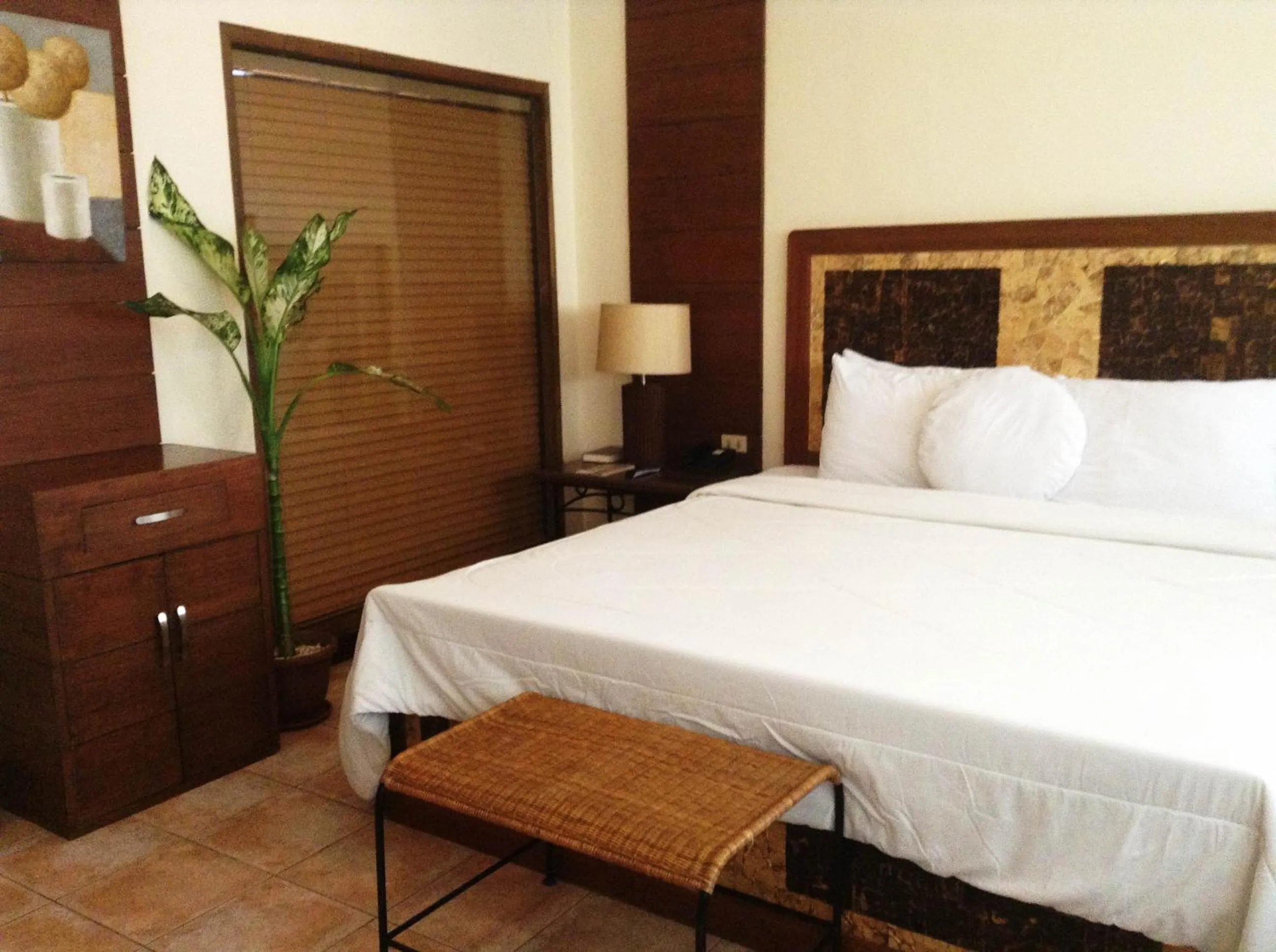 Bed in Citystate Asturias Hotel Palawan