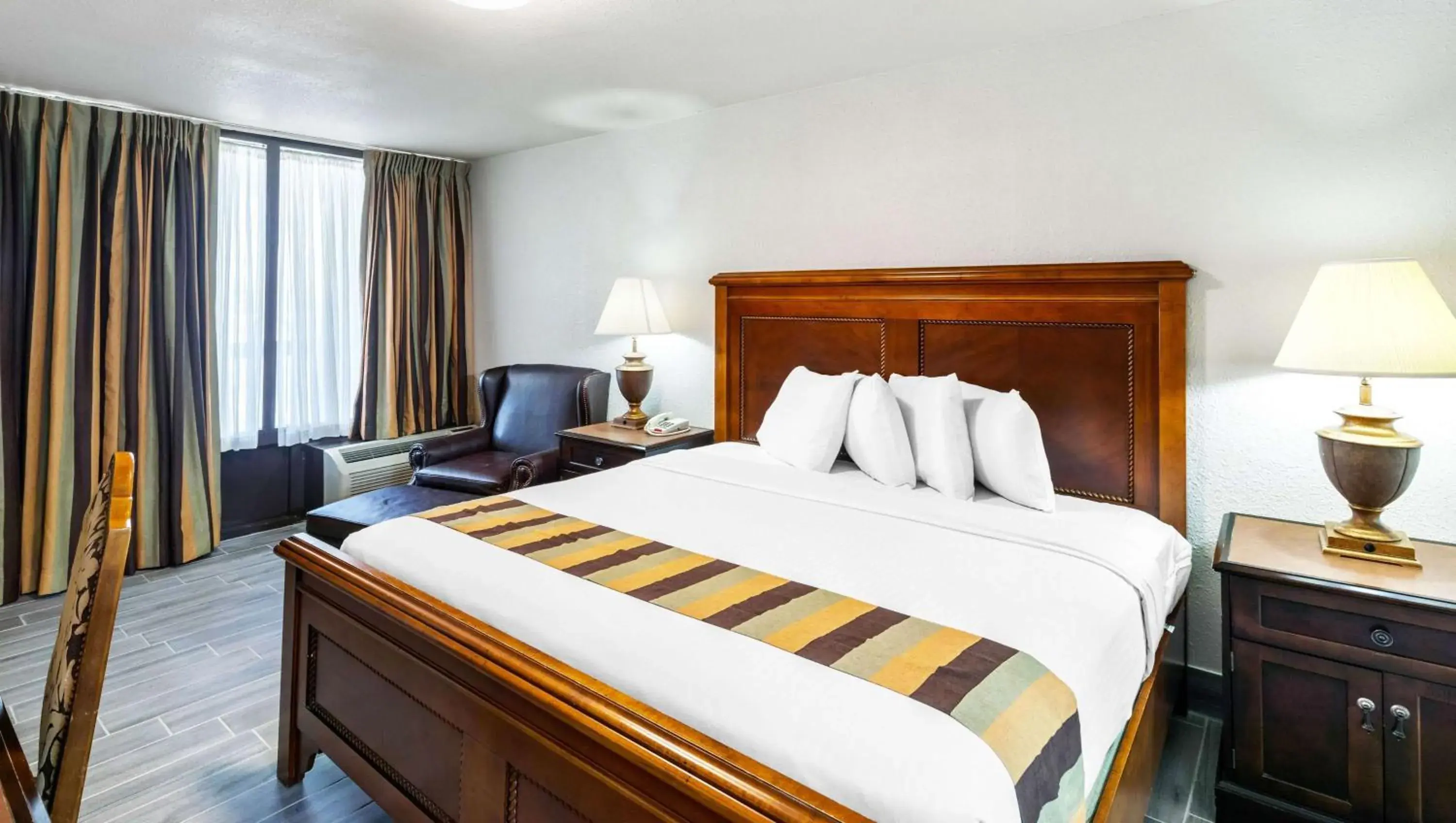 Photo of the whole room, Bed in Magnuson Grand Hotel and Conference Center Tyler Photo of the whole room, Bed in Magnuson Grand Hotel and Conference Center Tyler