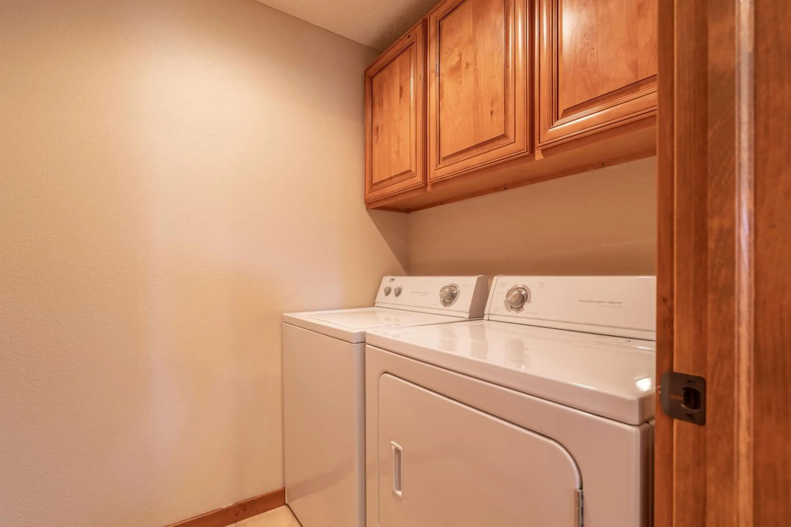 laundry, Kitchen/Kitchenette in The Lodges at Table Rock by Capital Vacations