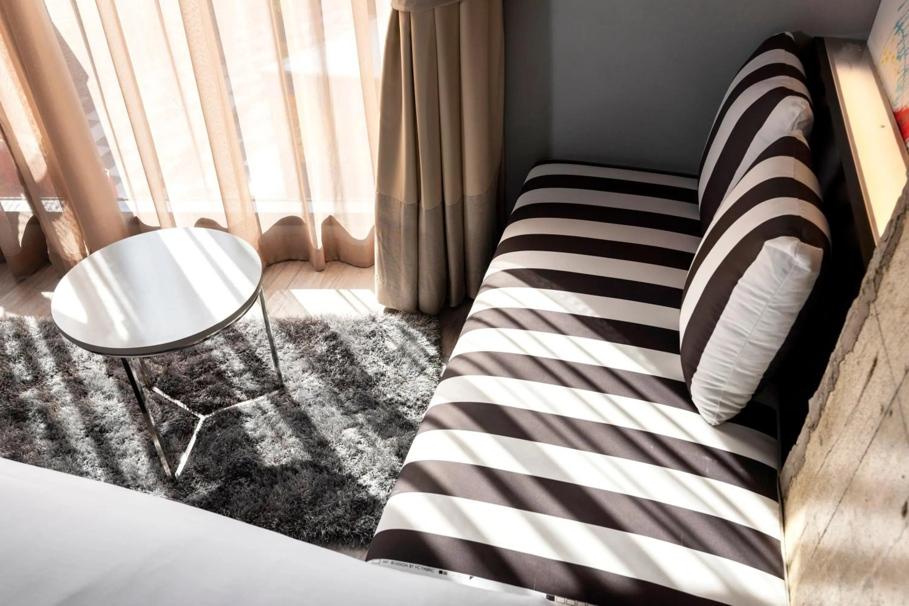 Seating area, Bed in MeStyle Museum Hotel