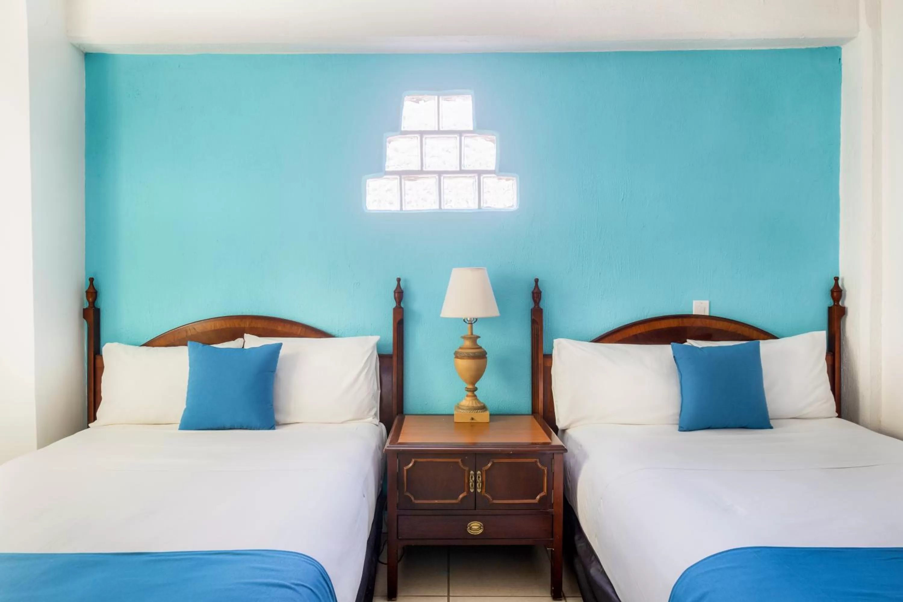 Bed in Hotel Pueblito Vallarta