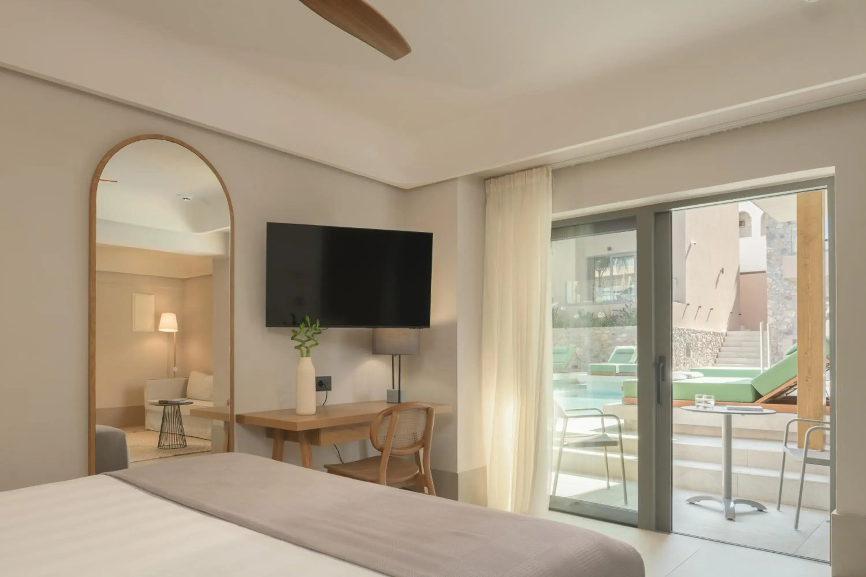 Bed, TV/Entertainment Center in Paralos Venus Suites Adults Only