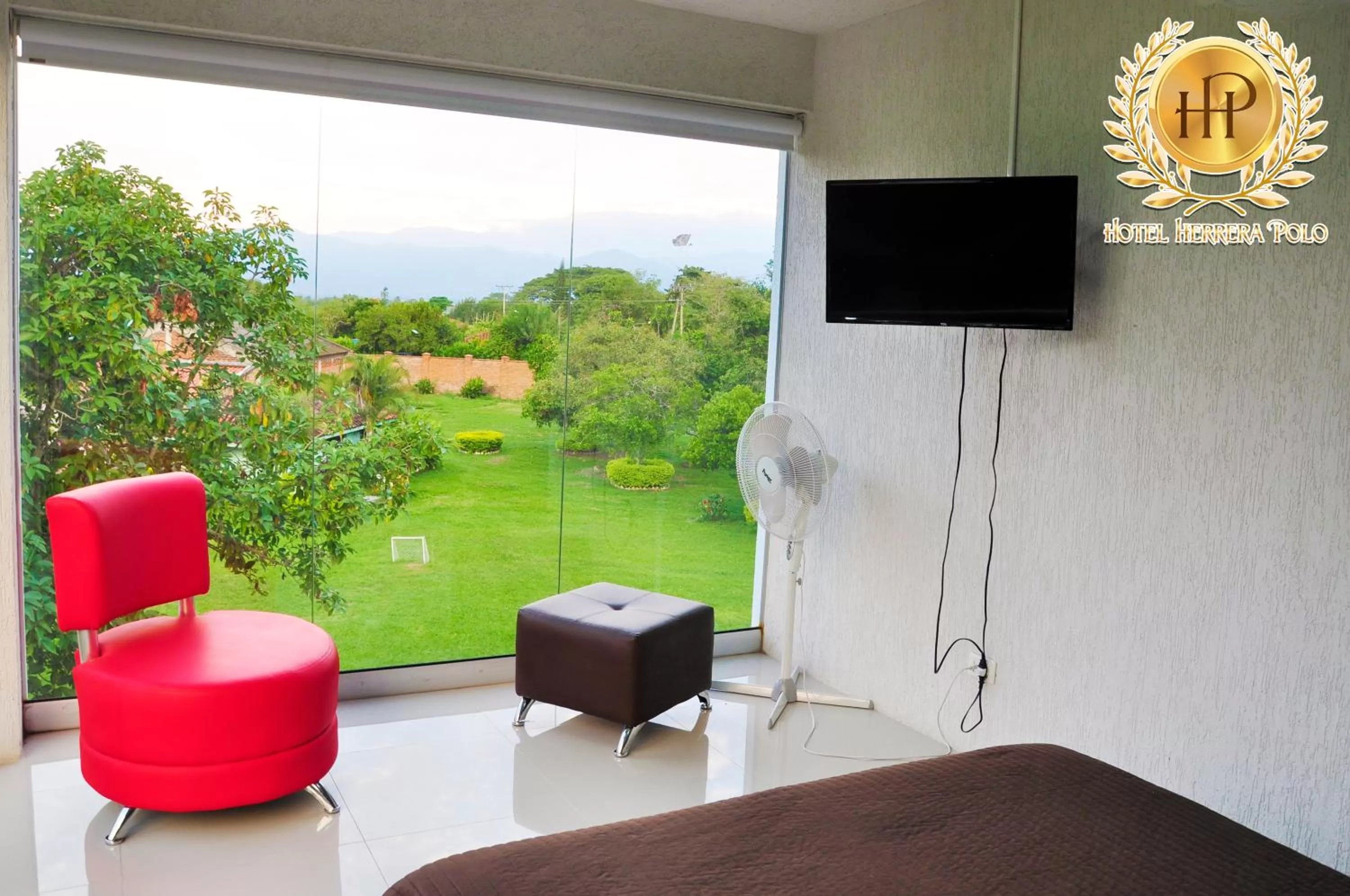 TV and multimedia, TV/Entertainment Center in Hotel Herrera Polo