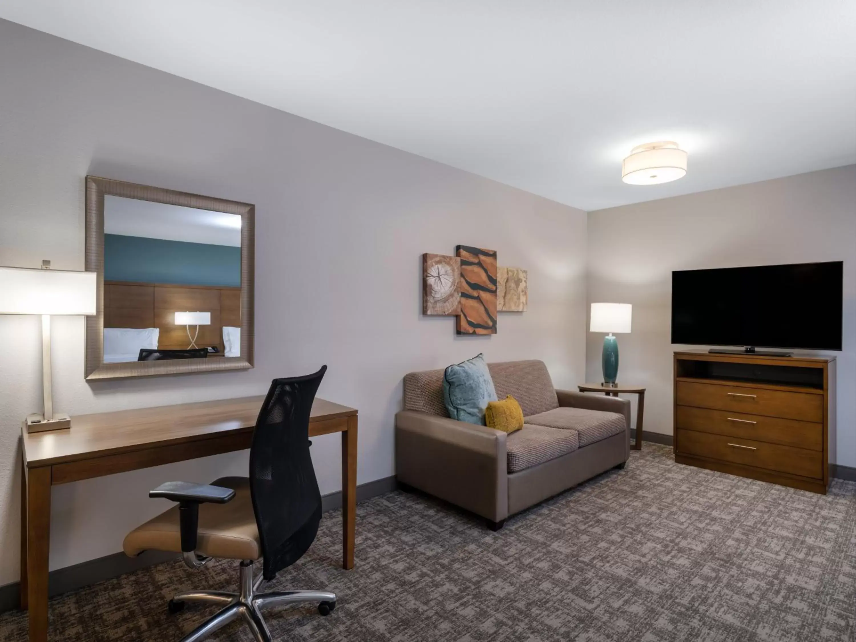 Photo of the whole room, TV/Entertainment Center in Staybridge Suites - Sioux City Southeast, an IHG Hotel