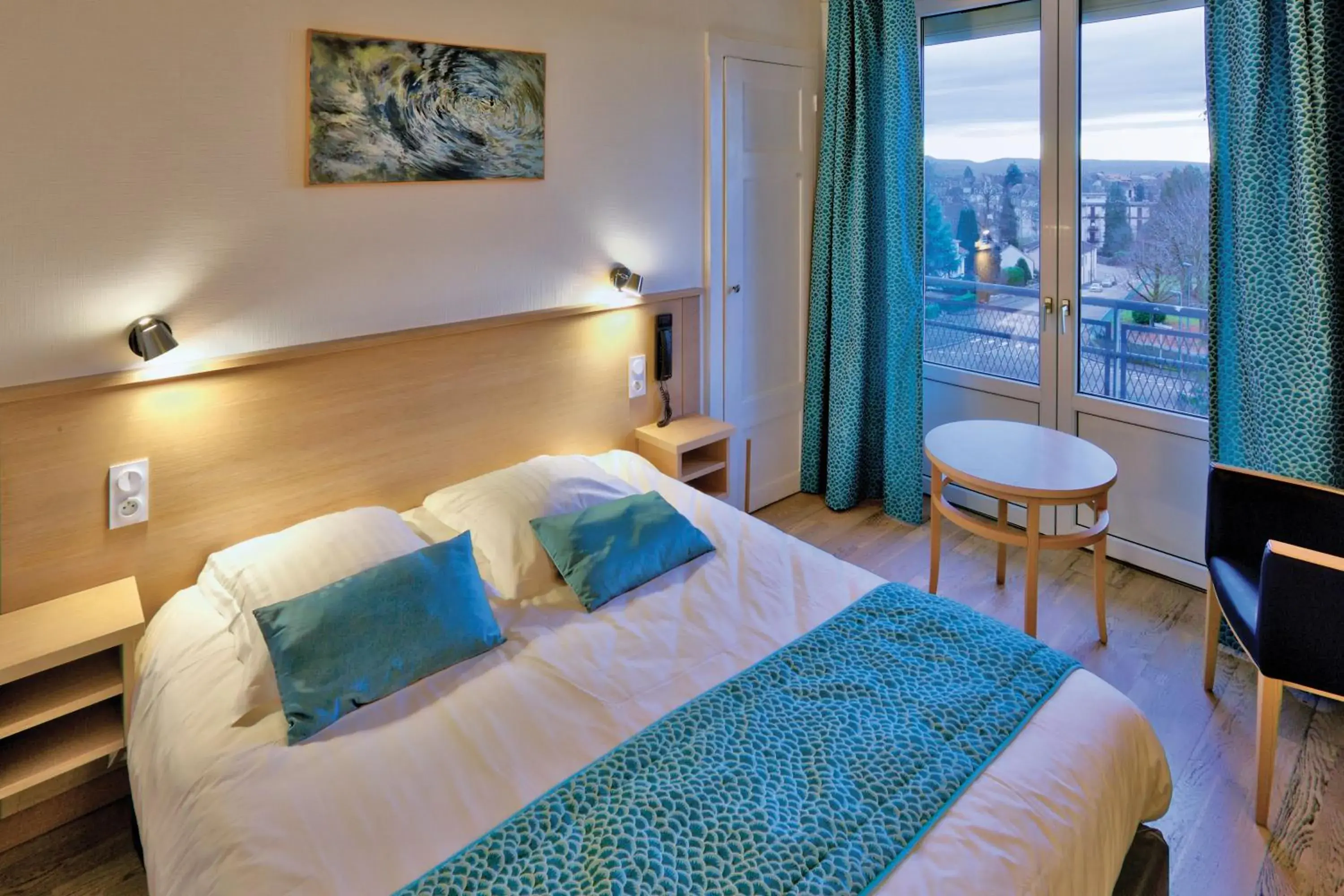 Bed in Logis Hotel Restaurant Spa Beau Site Bed in Logis Hotel Restaurant Spa Beau Site