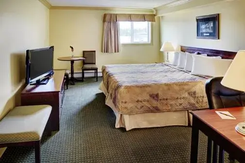 Photo of the whole room, Bed in Nova Inn Edson