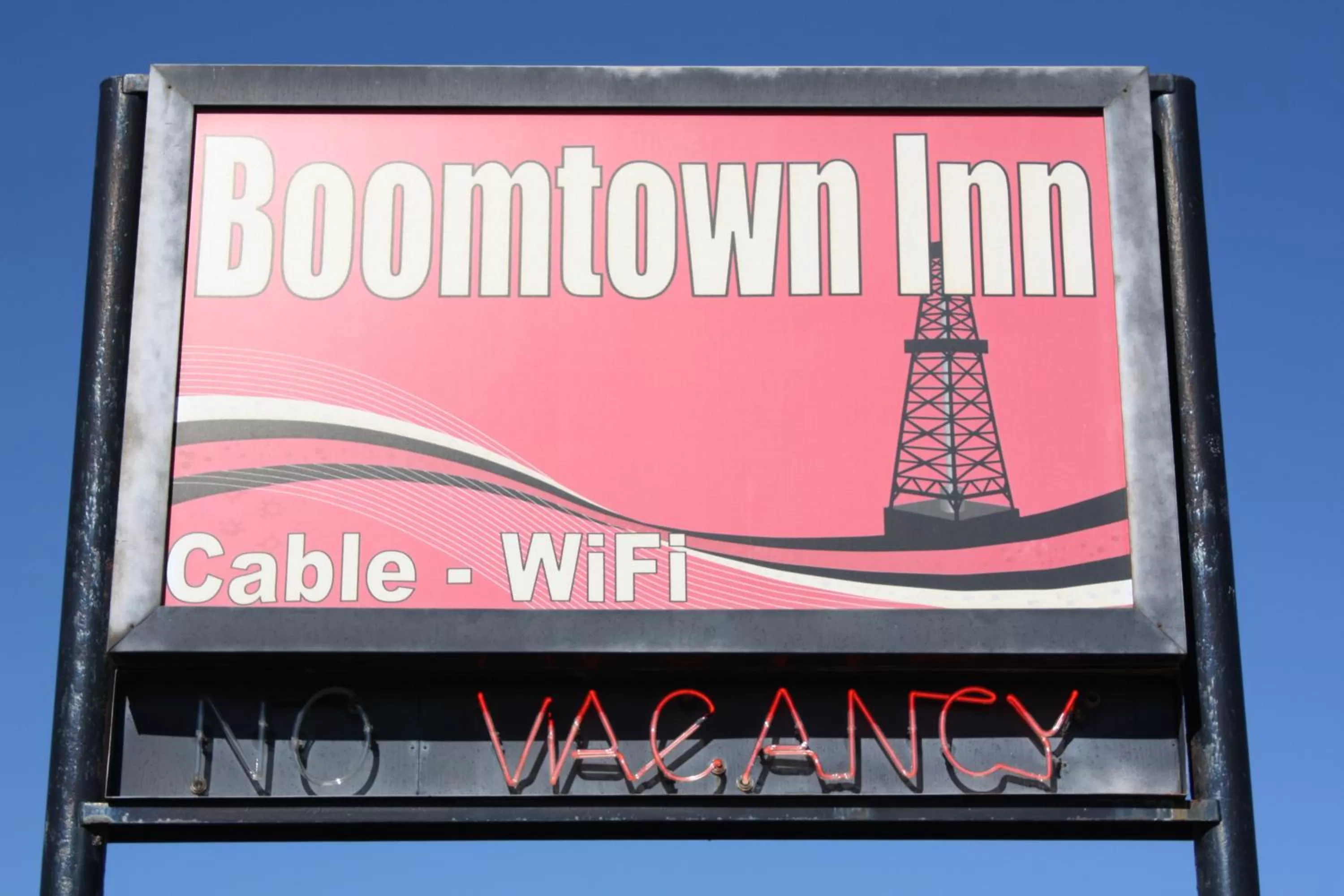 Property logo or sign in Boomtown Inn