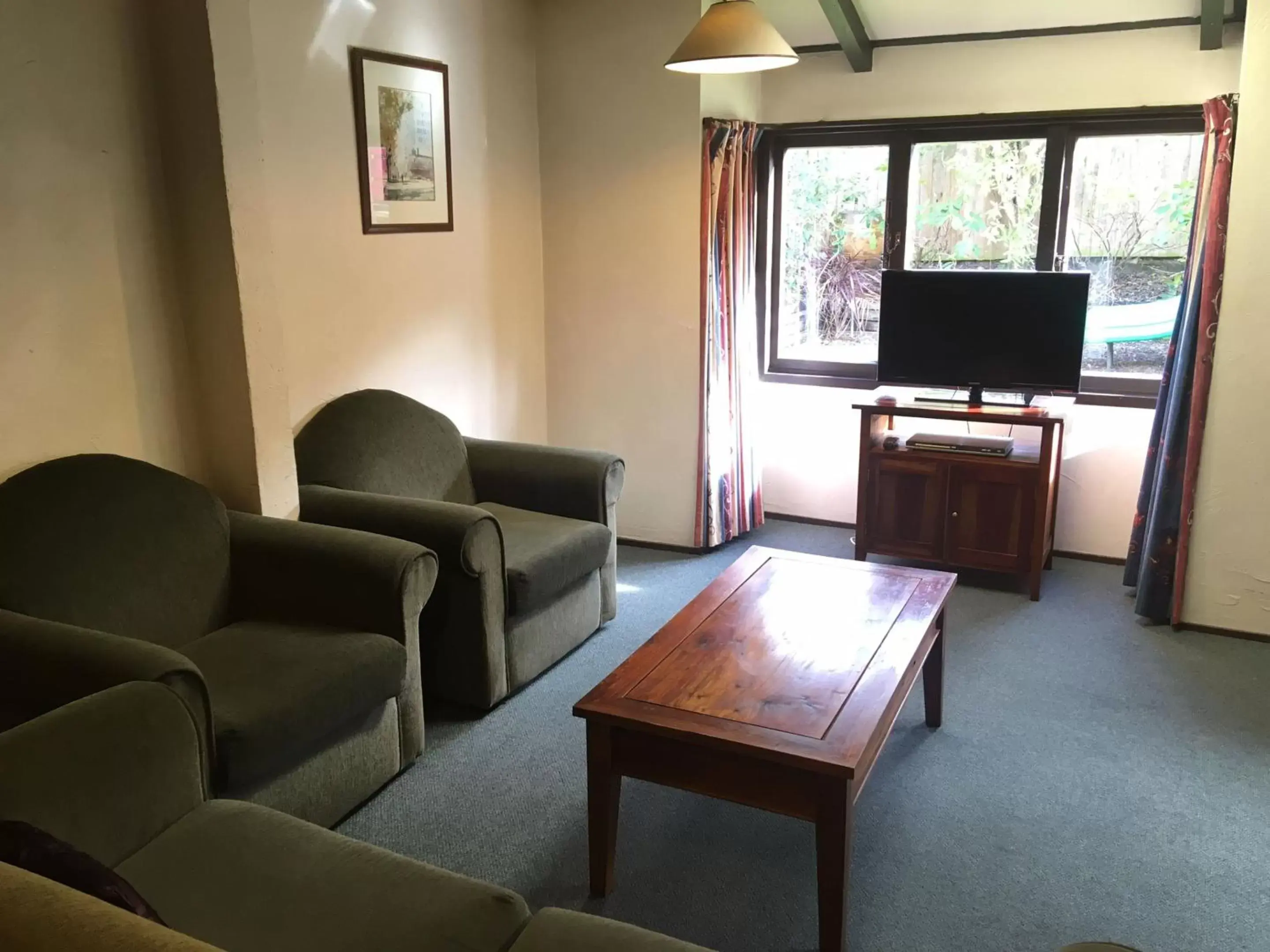 Living room, Seating Area in Woodlands Motels And Apartments