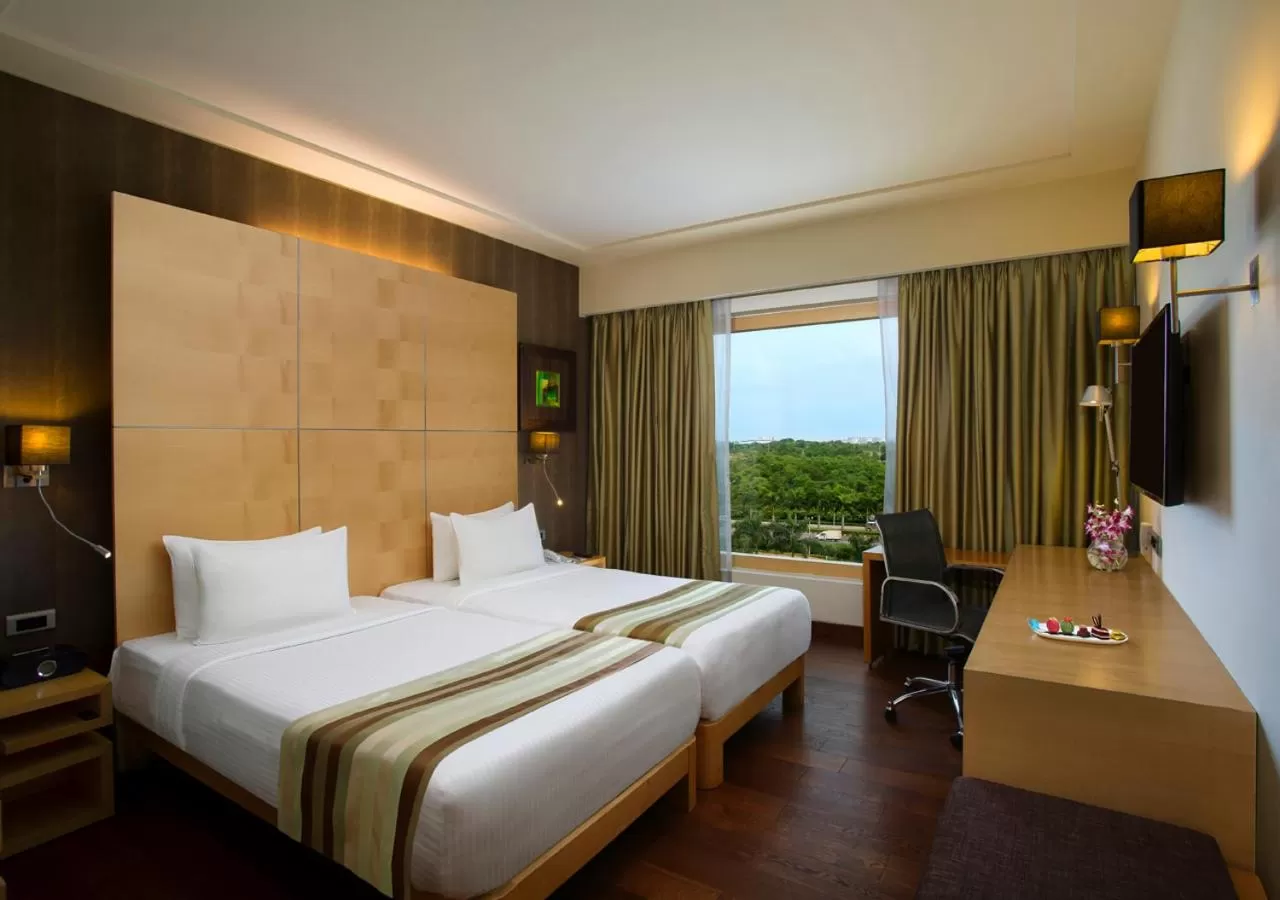 Photo of the whole room, Bed in Novotel Hyderabad Airport