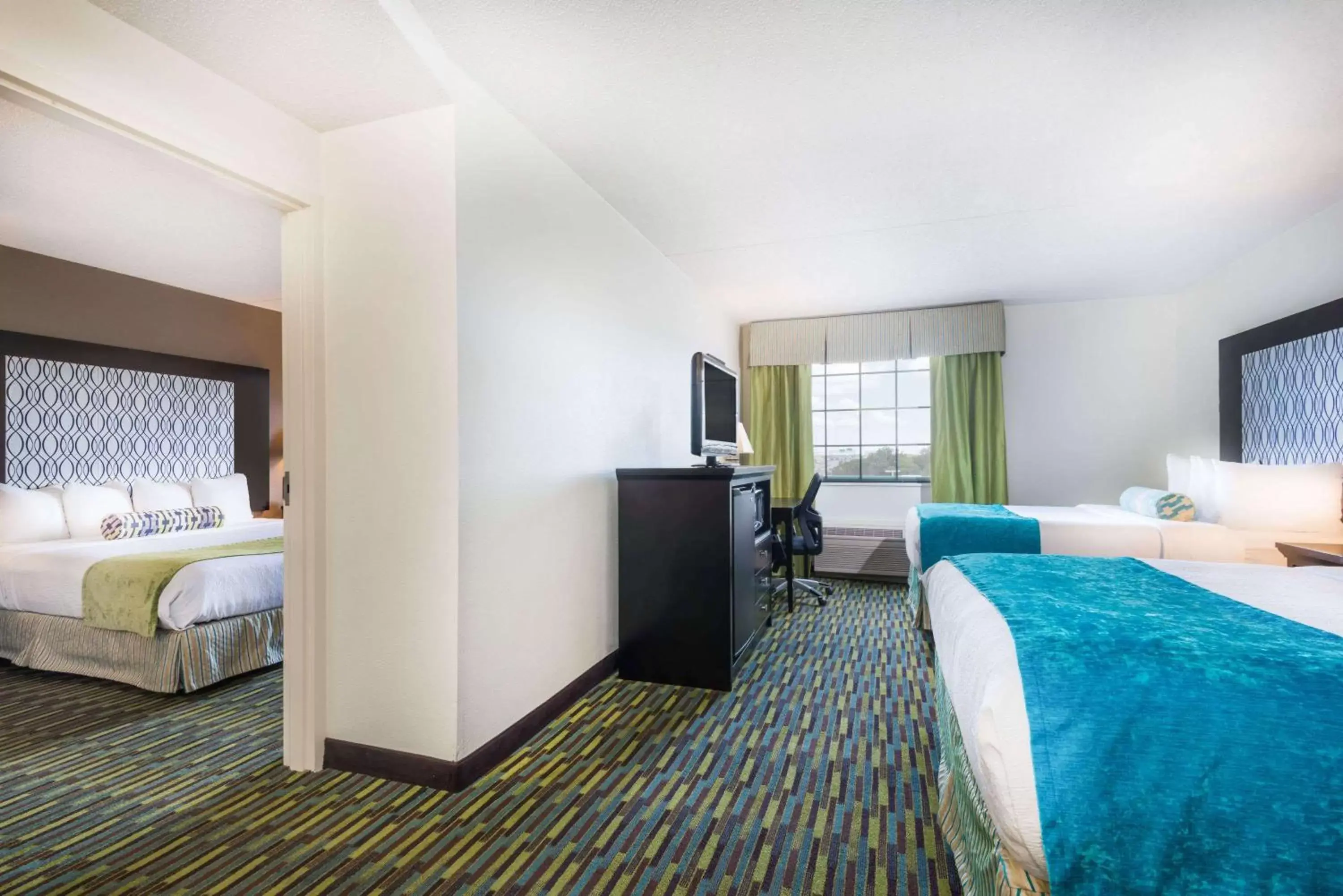 Photo of the whole room, Bed in Wyndham Garden Wichita Downtown