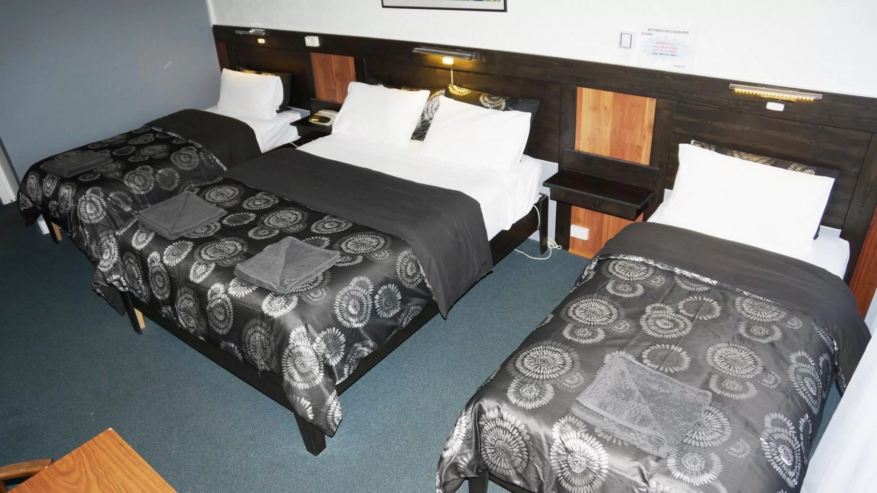 Bed in Golden Leaf Motel