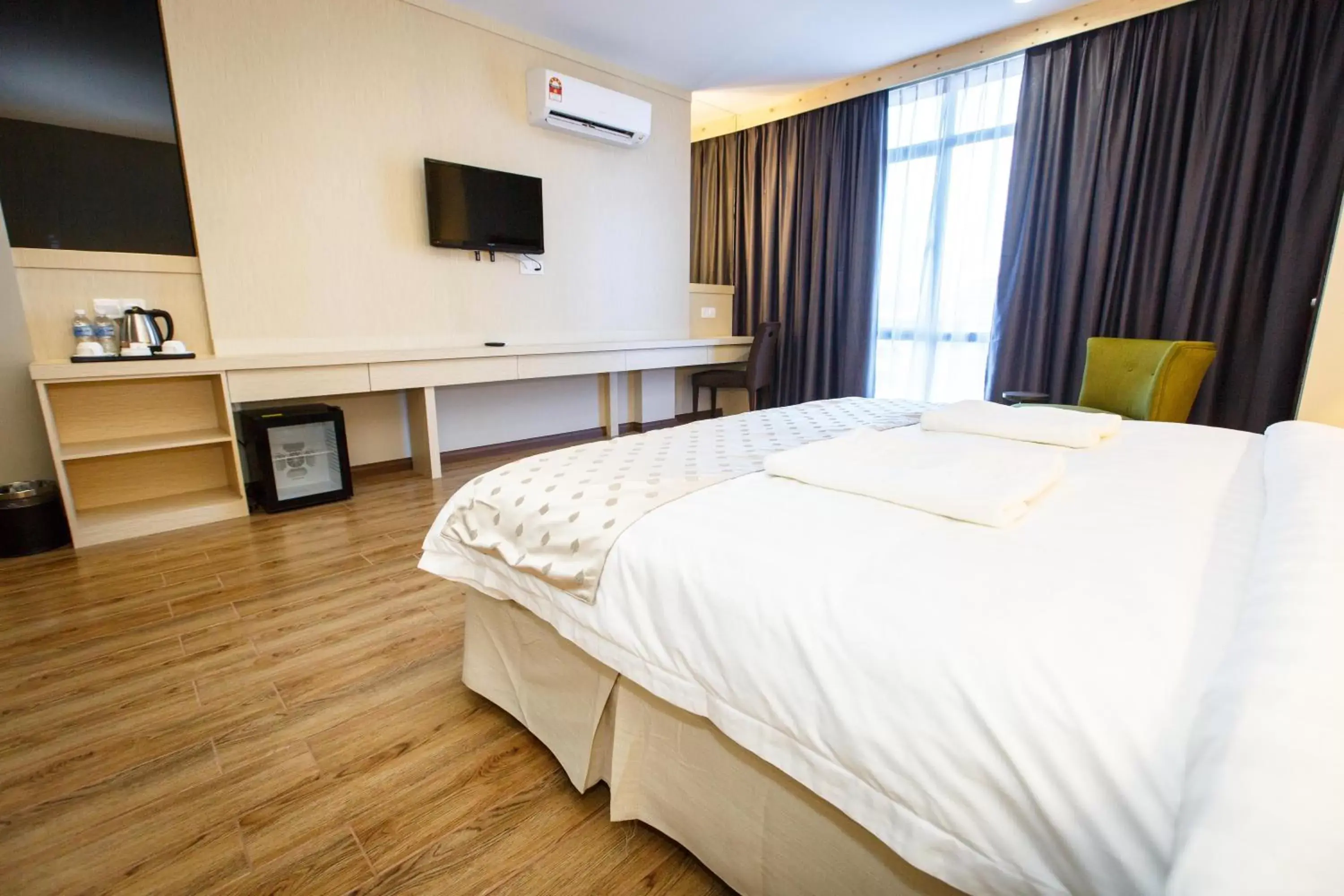 Bed in Lintas Platinum Hotel Bed in Lintas Platinum Hotel