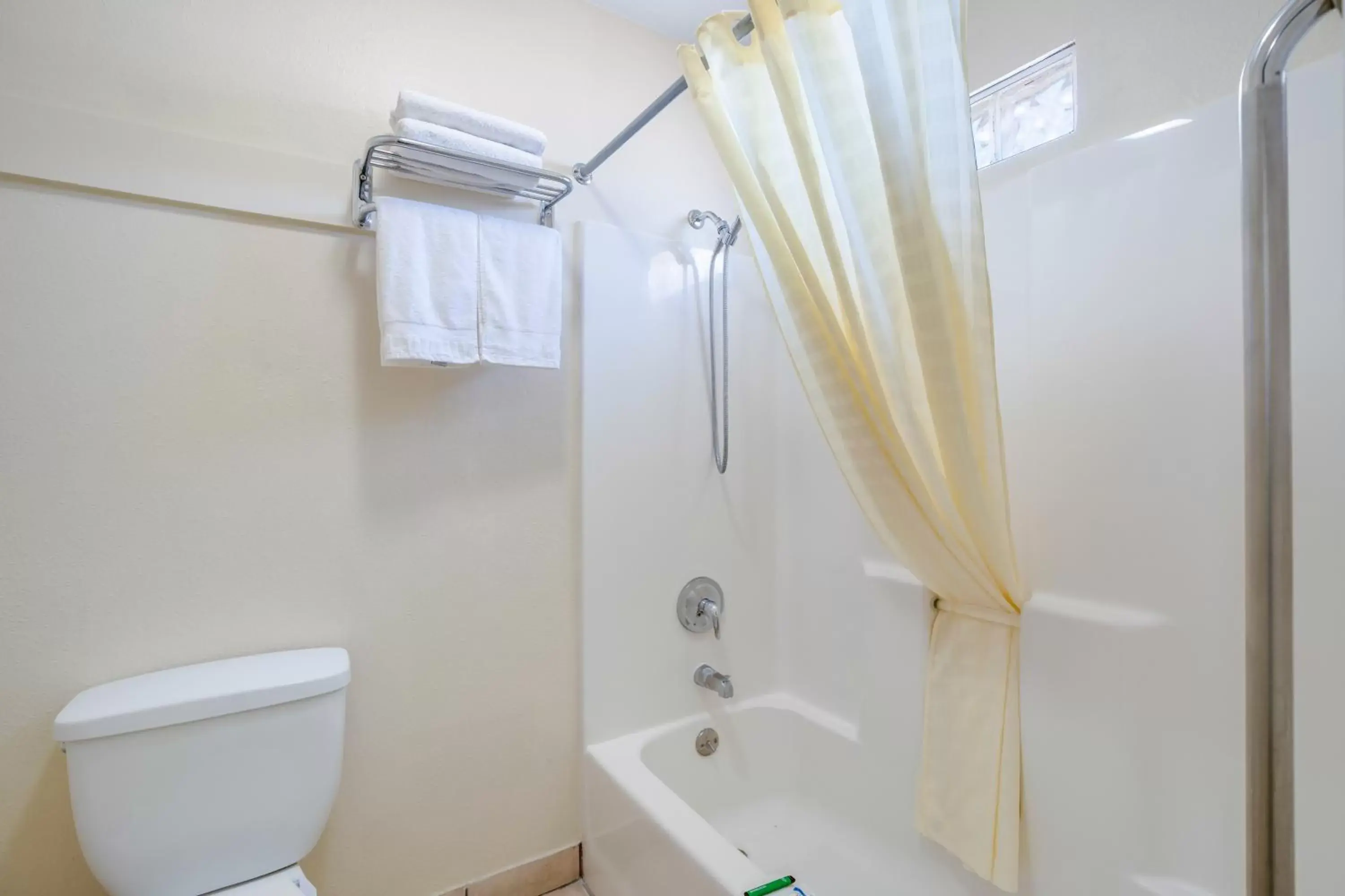 Property building, Bathroom in Rodeway Inn & Suites