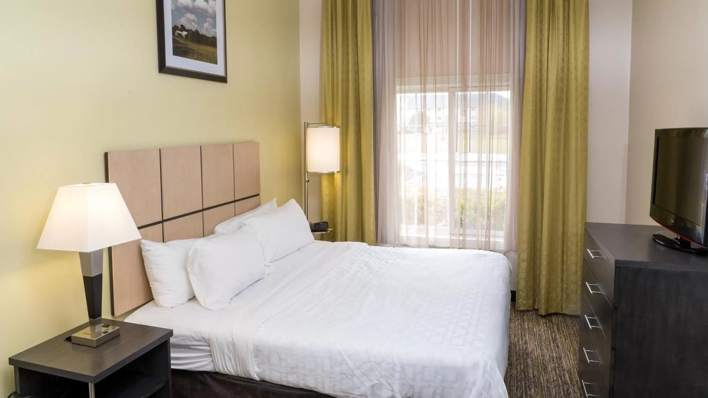 Photo of the whole room, Bed in Candlewood Suites Saint Joseph - Benton Harbor, an IHG Hotel