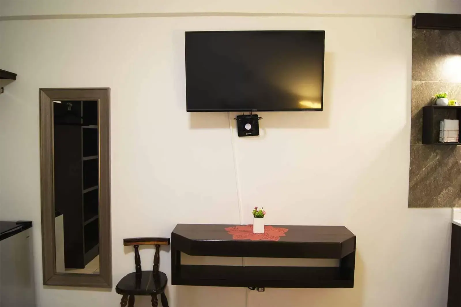 TV and multimedia, TV/Entertainment Center in Cabo Tortuga Hotel Boutique