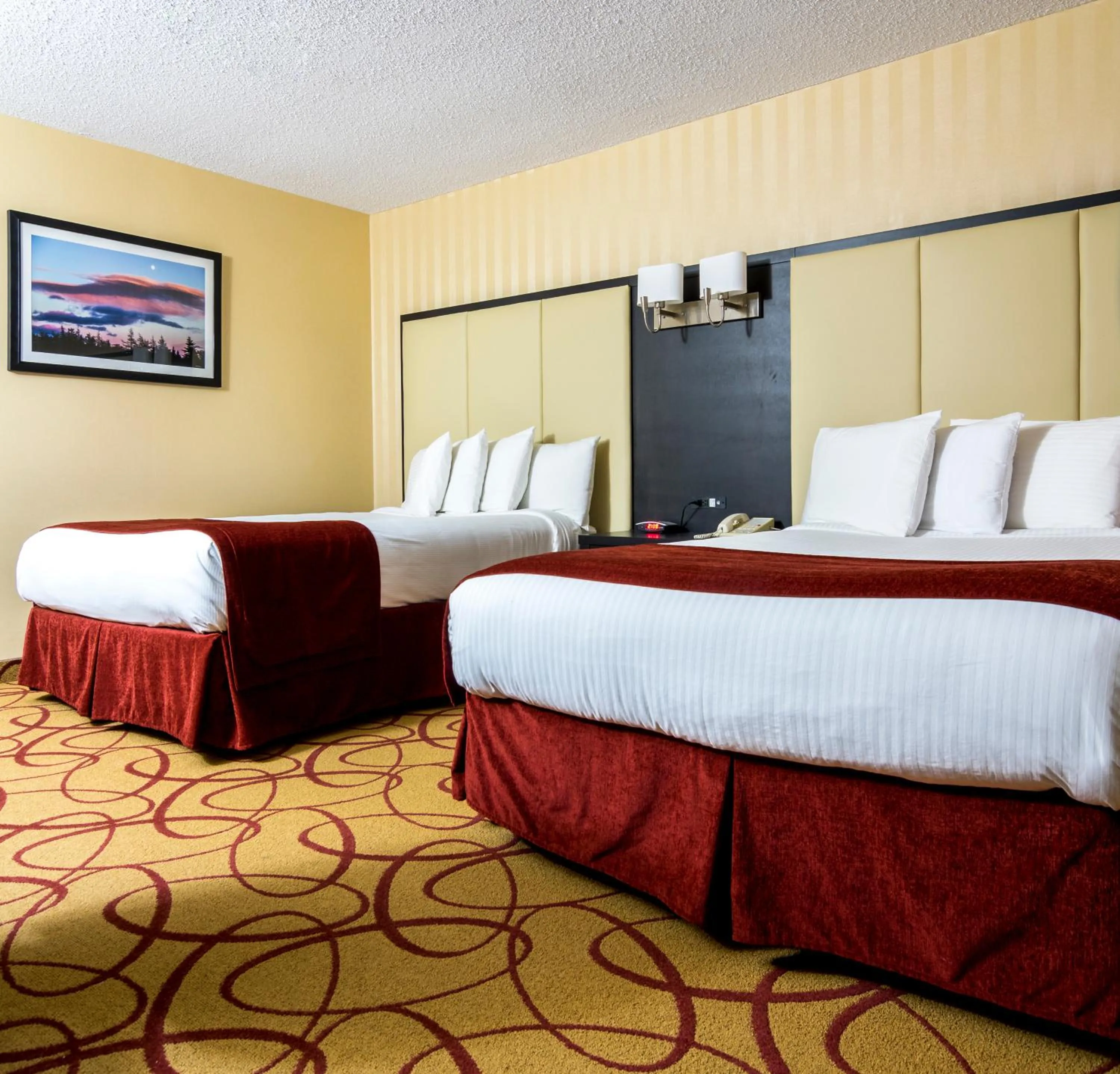 Bed in Sinbads Hotel & Suites