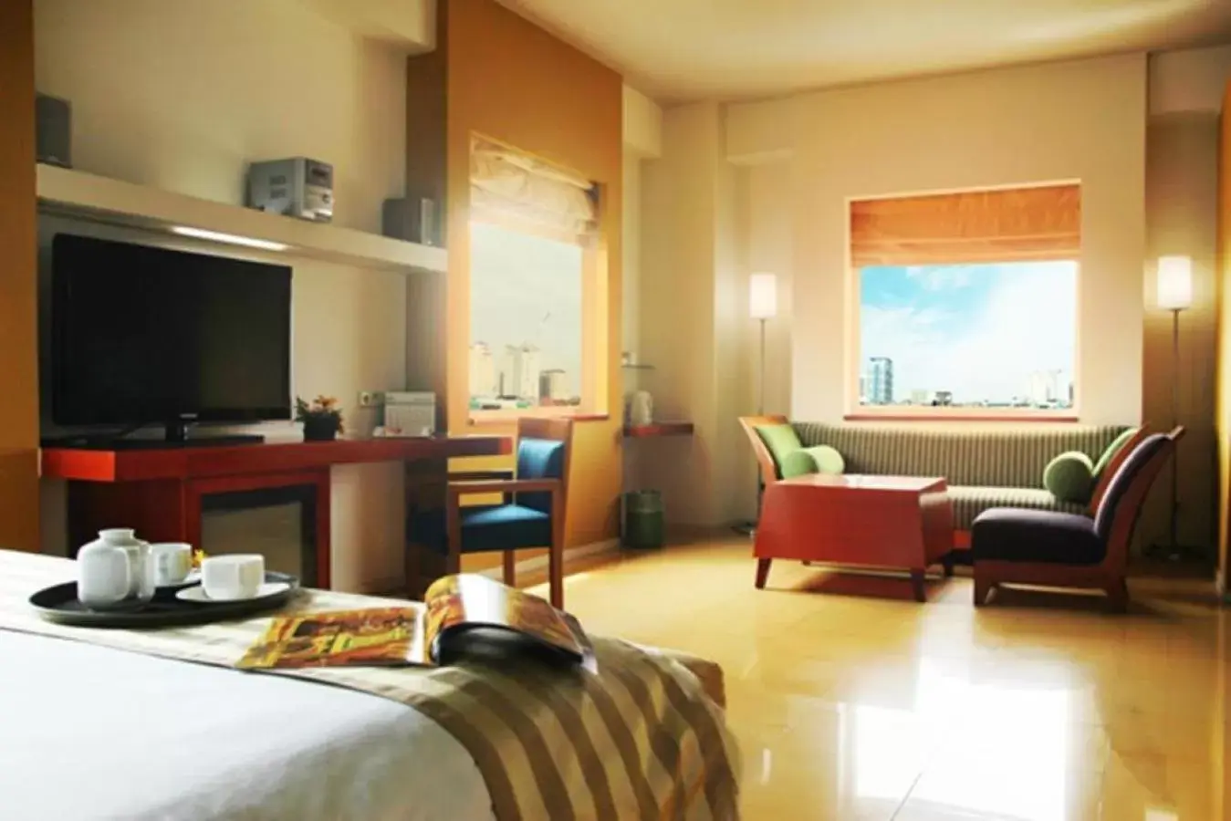 Bed, TV/Entertainment Center in Sparks Life Jakarta, ARTOTEL Curated