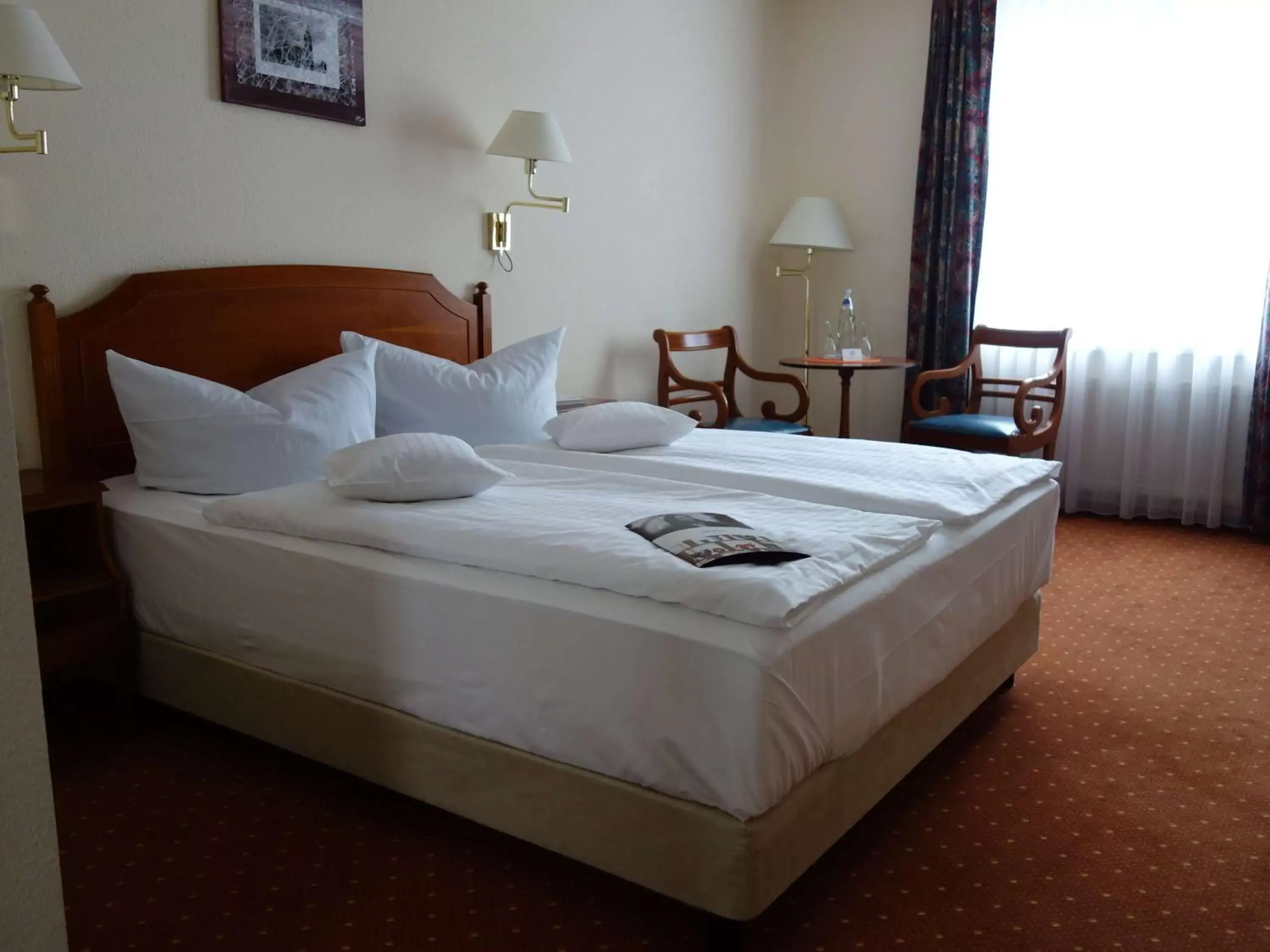 Photo of the whole room, Bed in Mercure Hotel Plaza Magdeburg