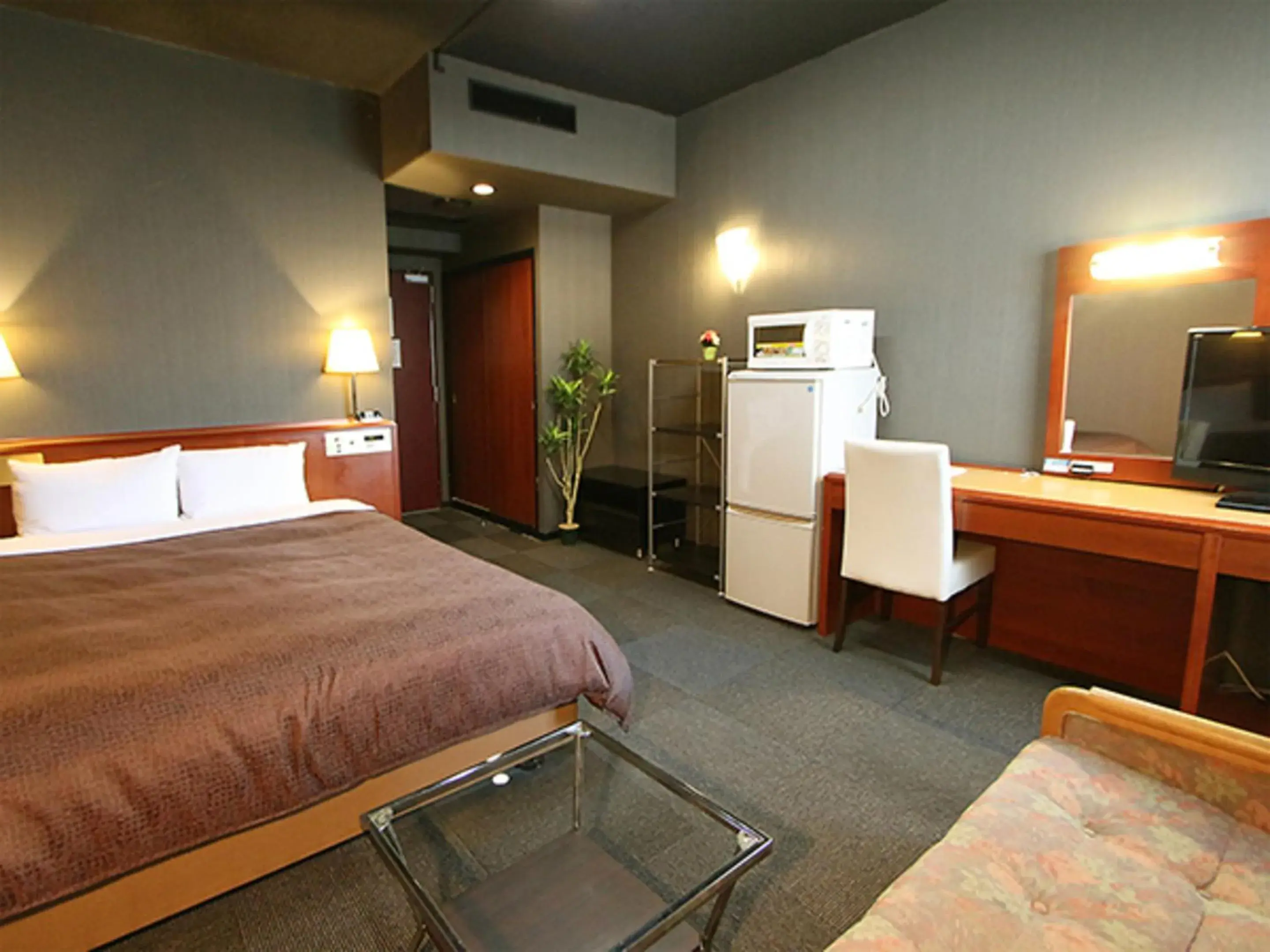 Bed in HOTEL LiVEMAX BUDGET Yokohama Tsurumi