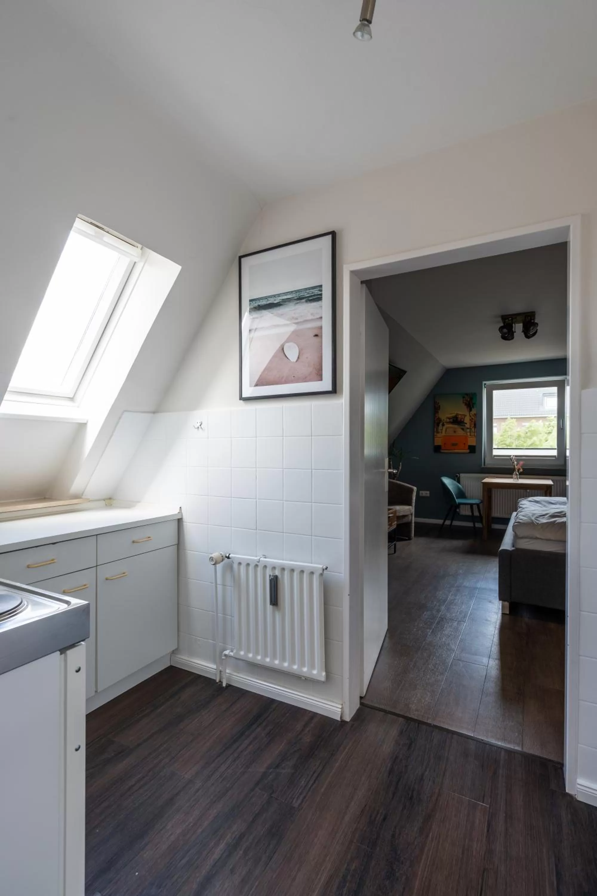 Kitchen or kitchenette, Bed in Hotel Luina Beach