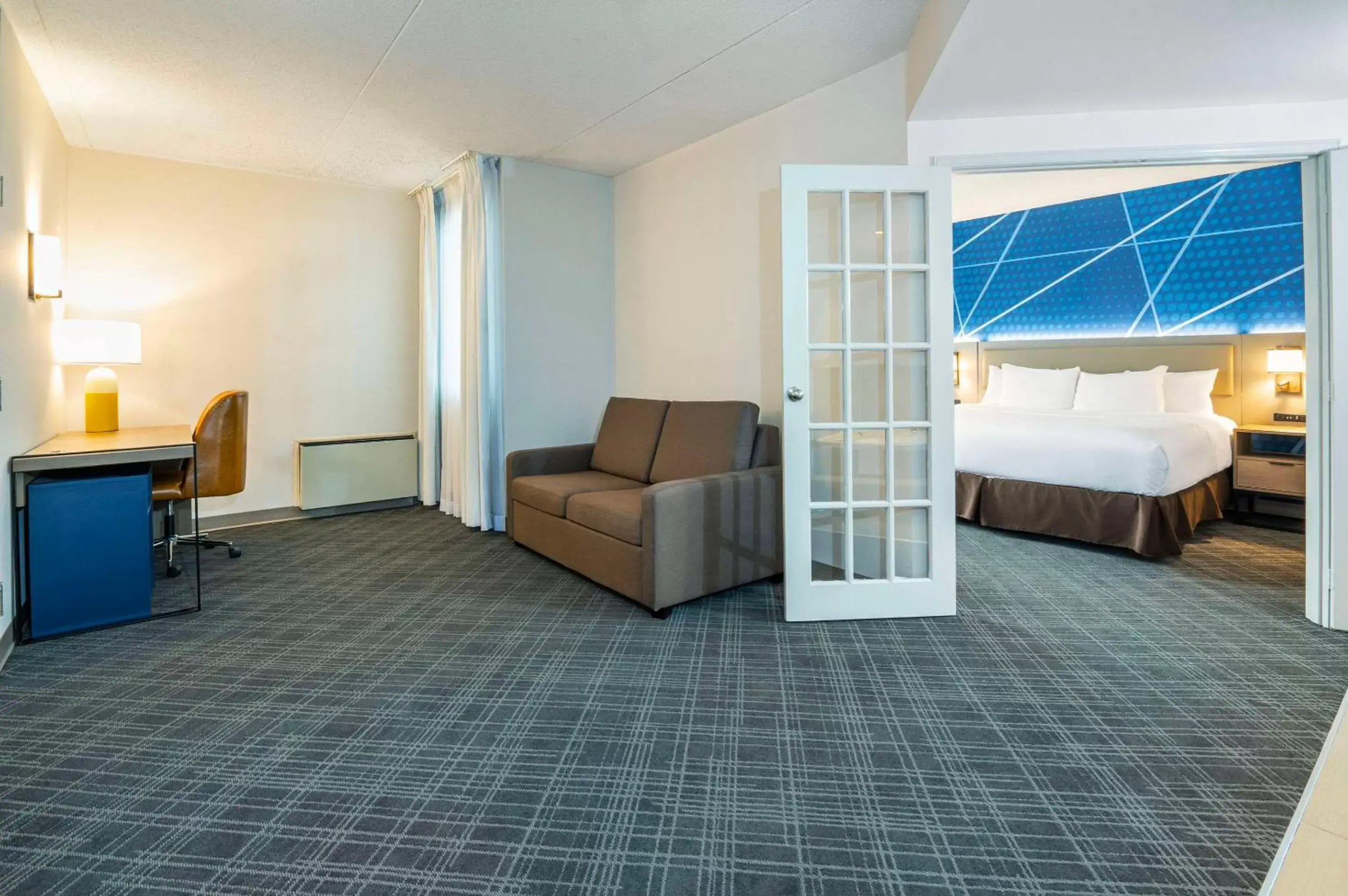 Bedroom, Seating Area in Comfort Inn & Suites Barrie