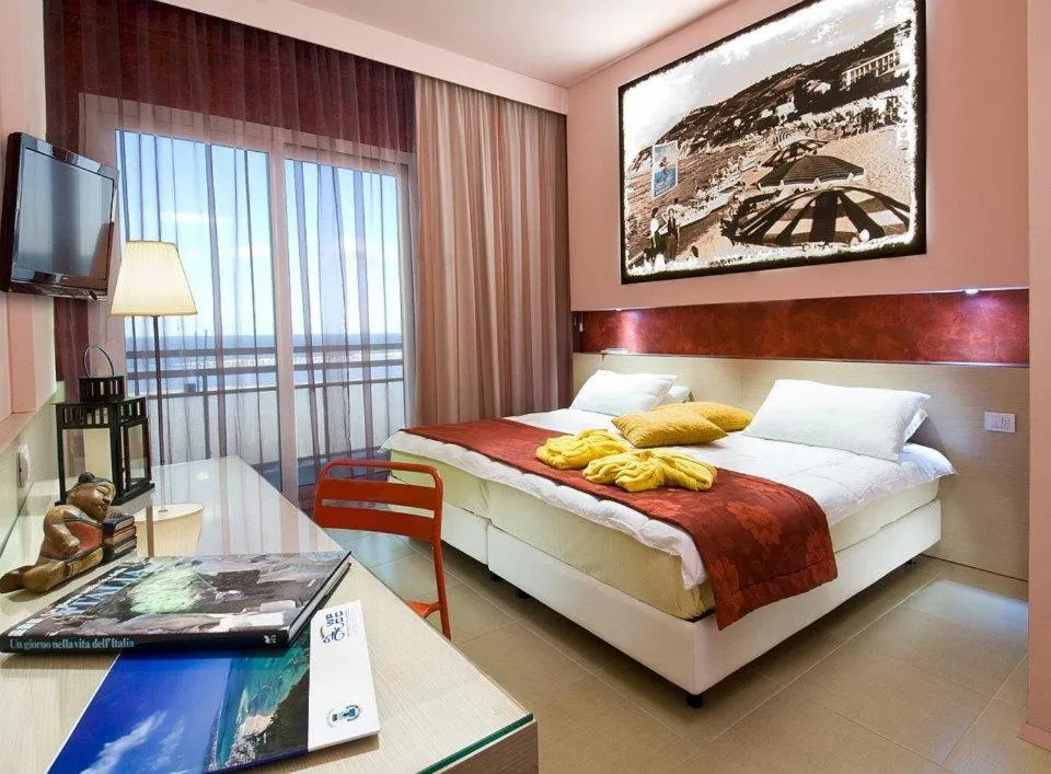 Bed in Hotel Resort Marinella
