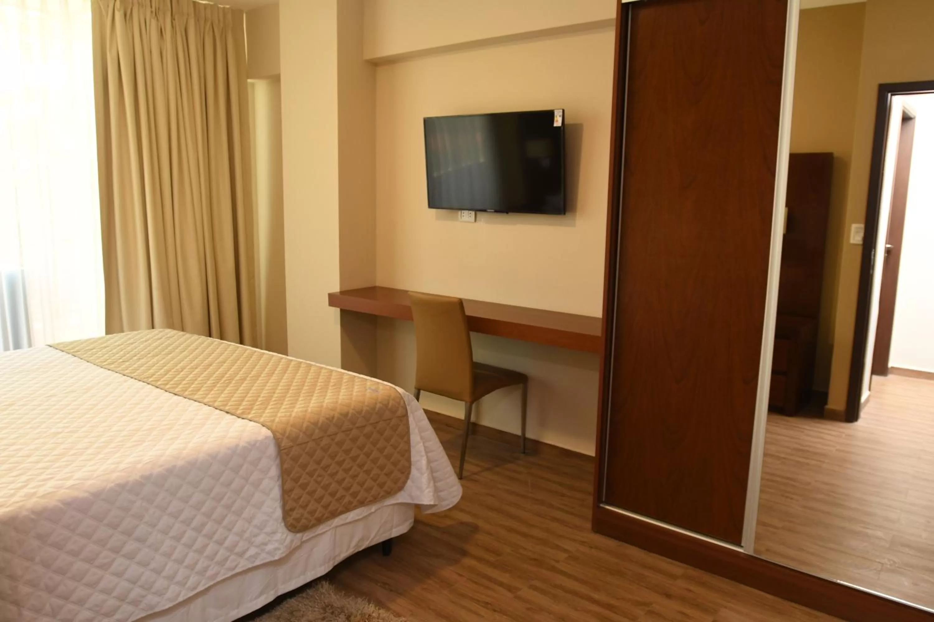 Bed in Taos Apart Hotel