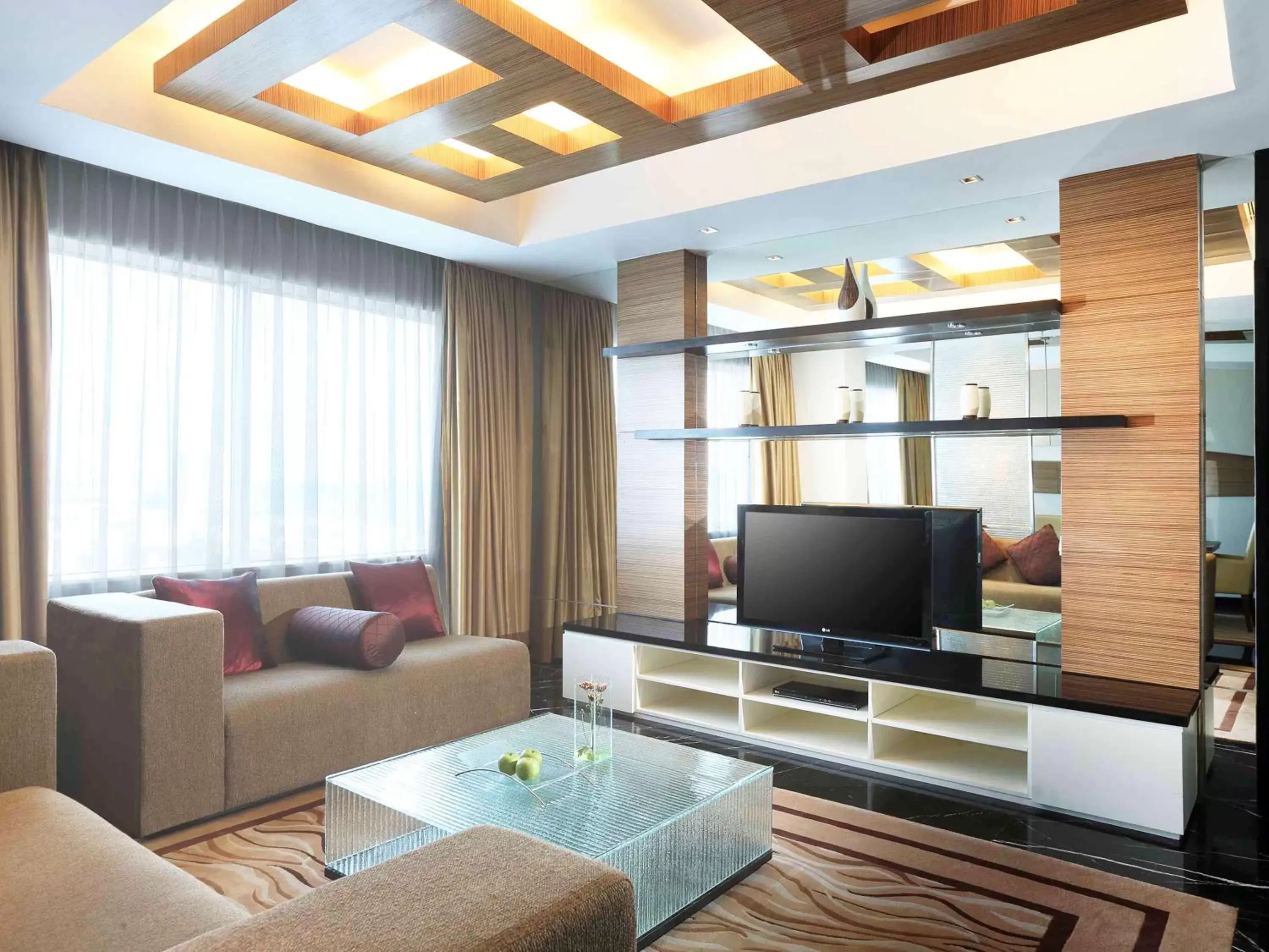 Photo of the whole room, TV/Entertainment Center in Novotel Balikpapan