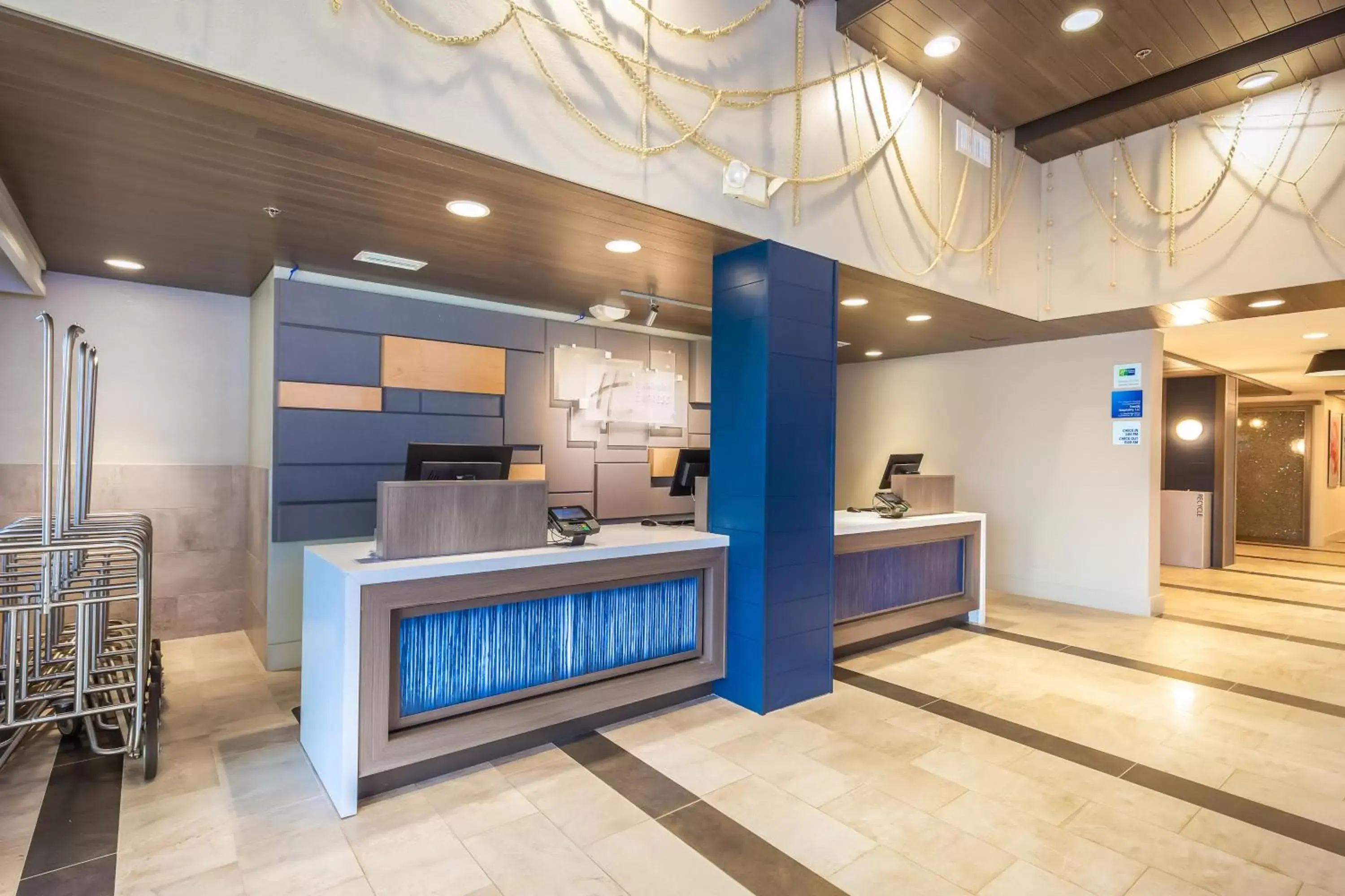 Property building, Lobby/Reception in Holiday Inn Express Orange Beach - On The Beach, an IHG Hotel