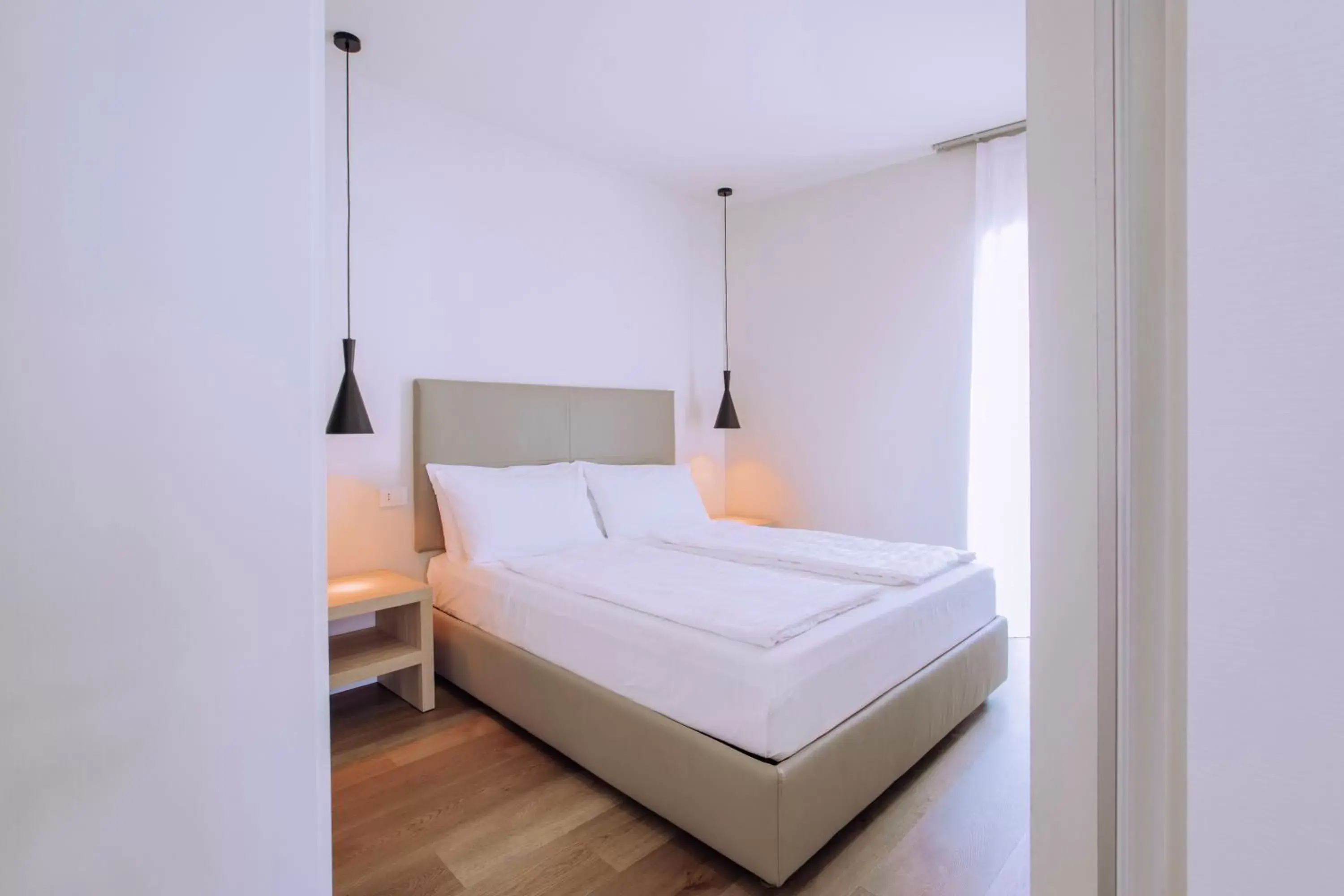 Bed in Ah Porticcioli Boutique Apartments