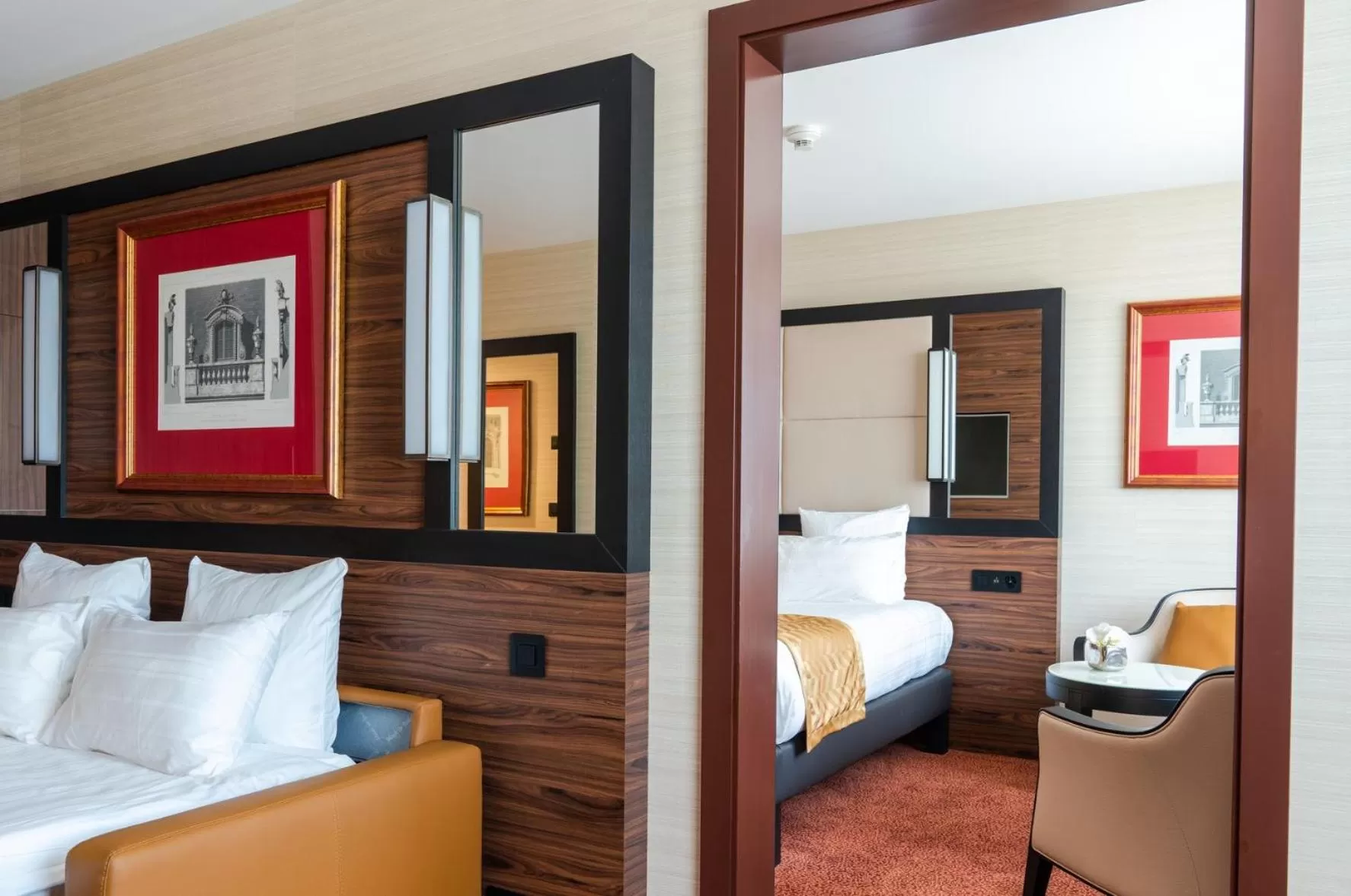 Living room, Bed in Nash Suites Airport Hotel