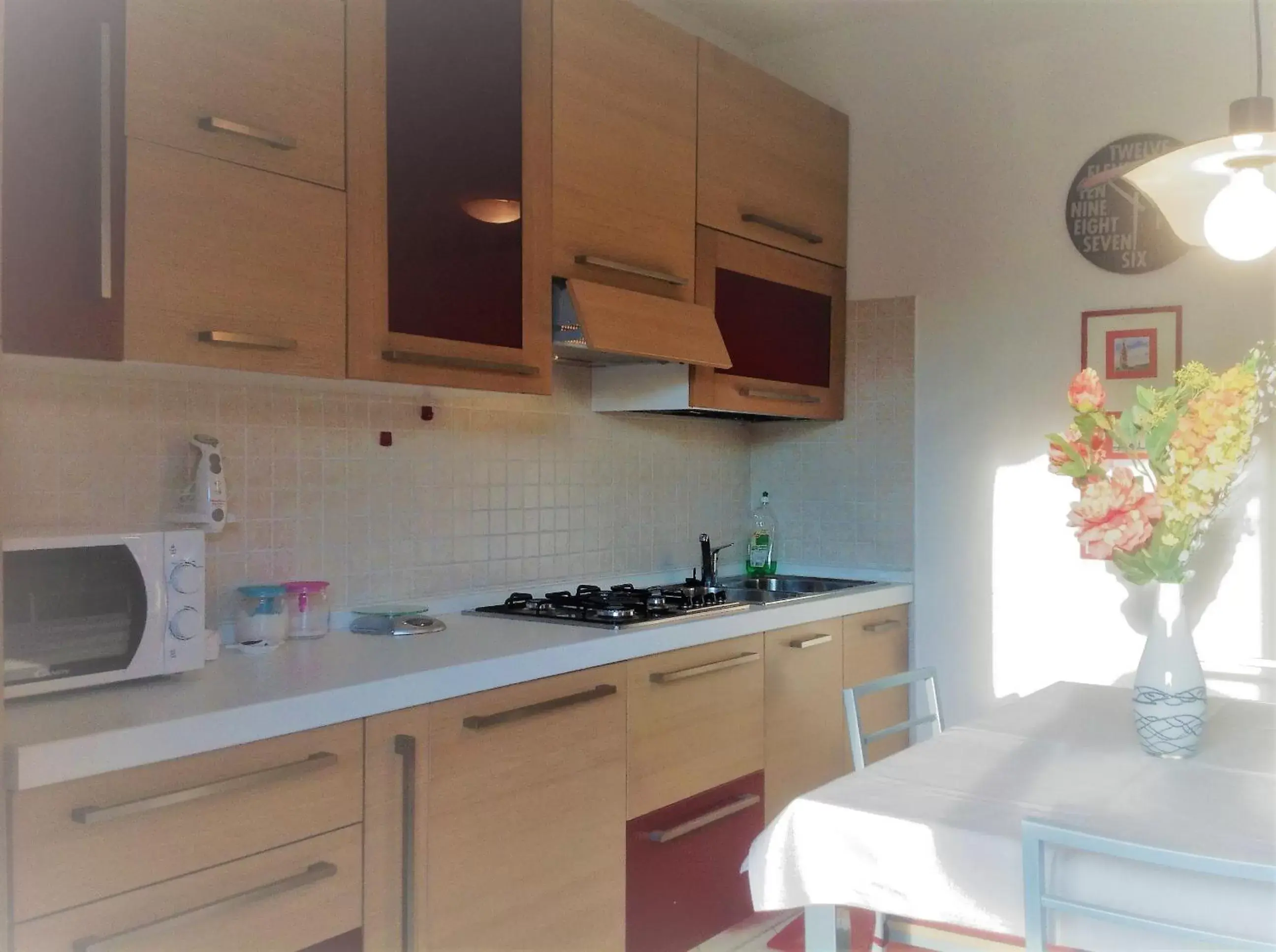 Kitchen/Kitchenette in Villaggio dei Fiori Apart- Hotel 3 Stars - Family Resort