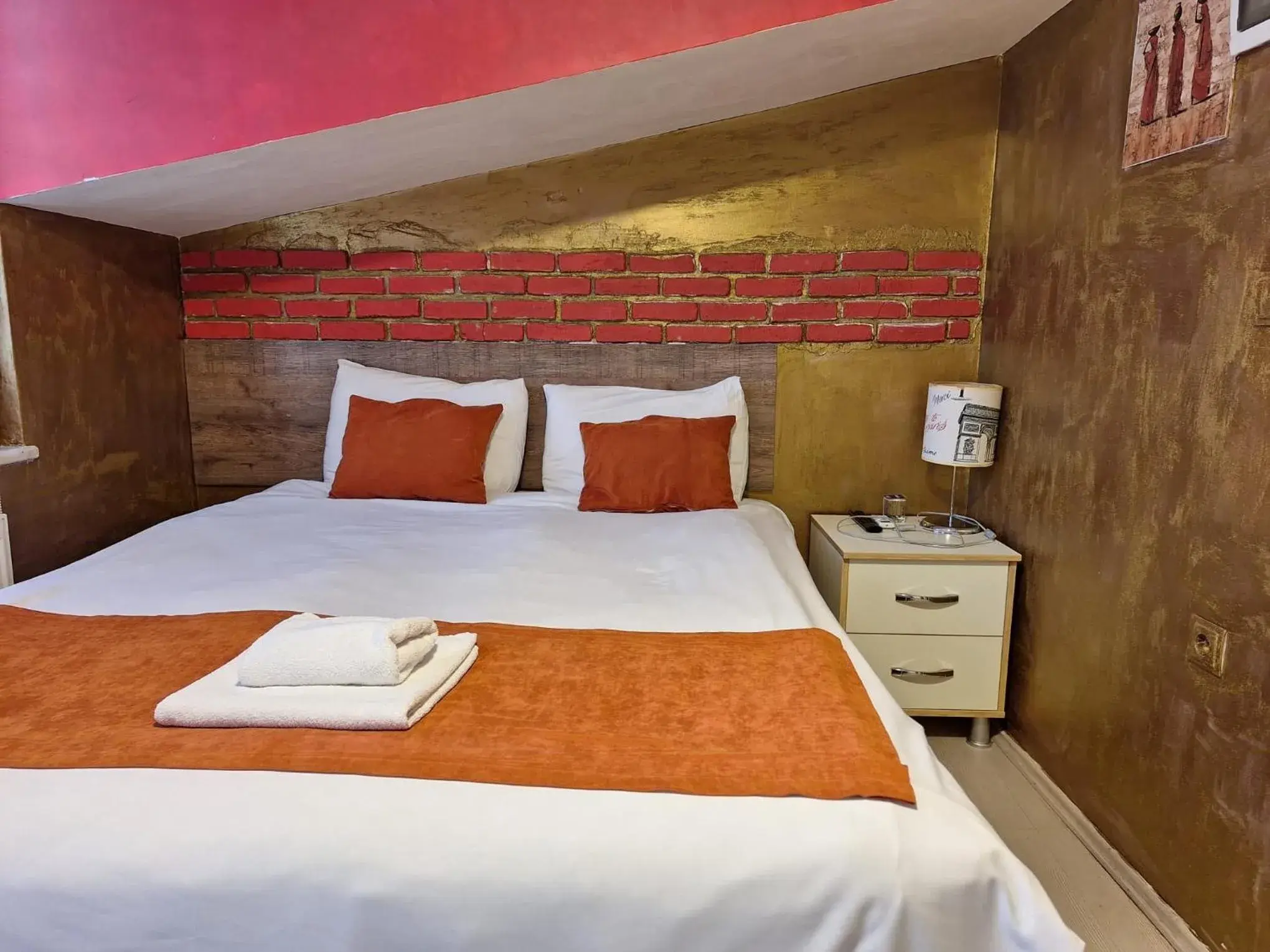 Bed in ADOR TROIA HOTEL