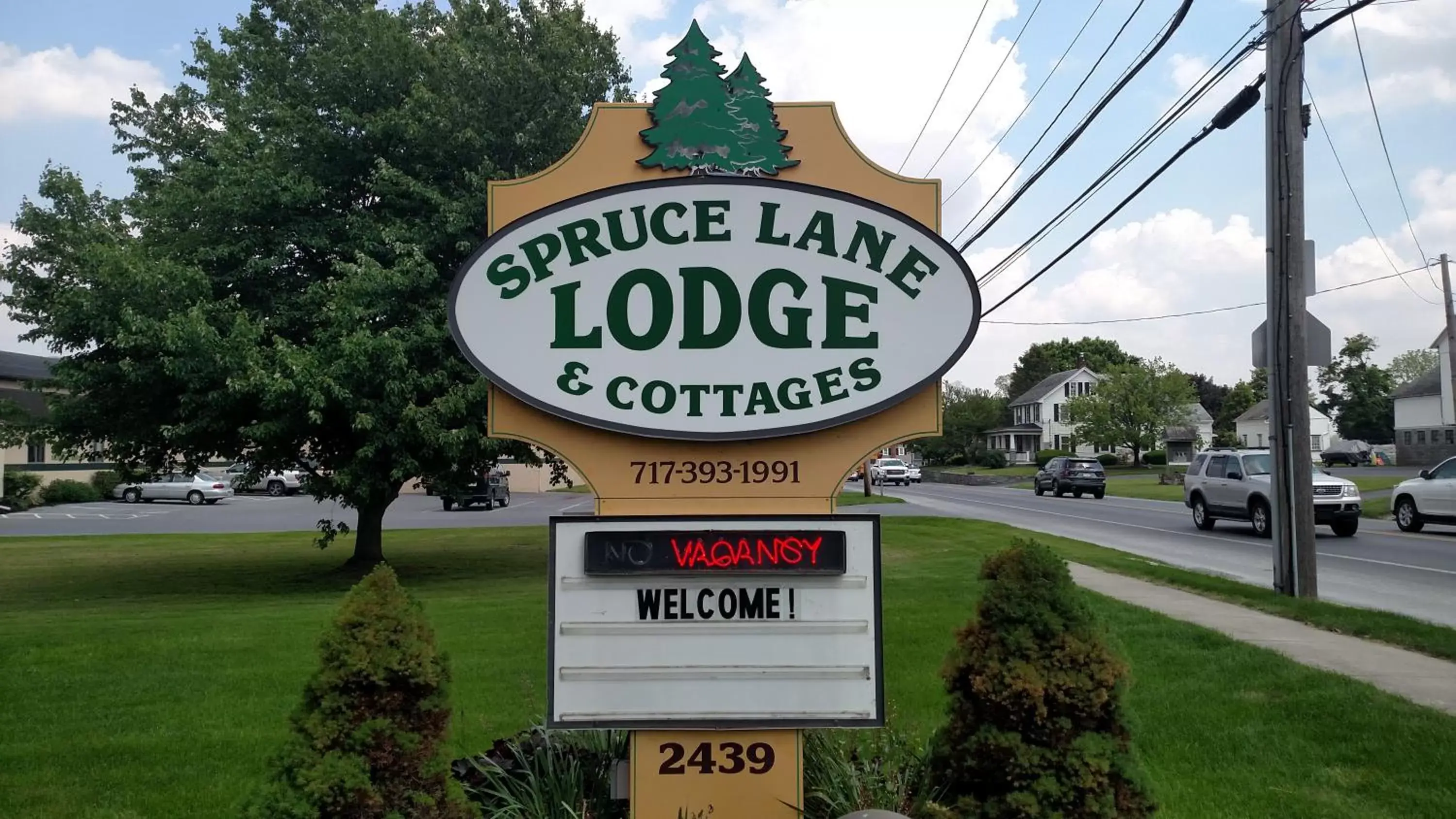 Property logo or sign, Property Building in Spruce Lane Lodge and Cottages