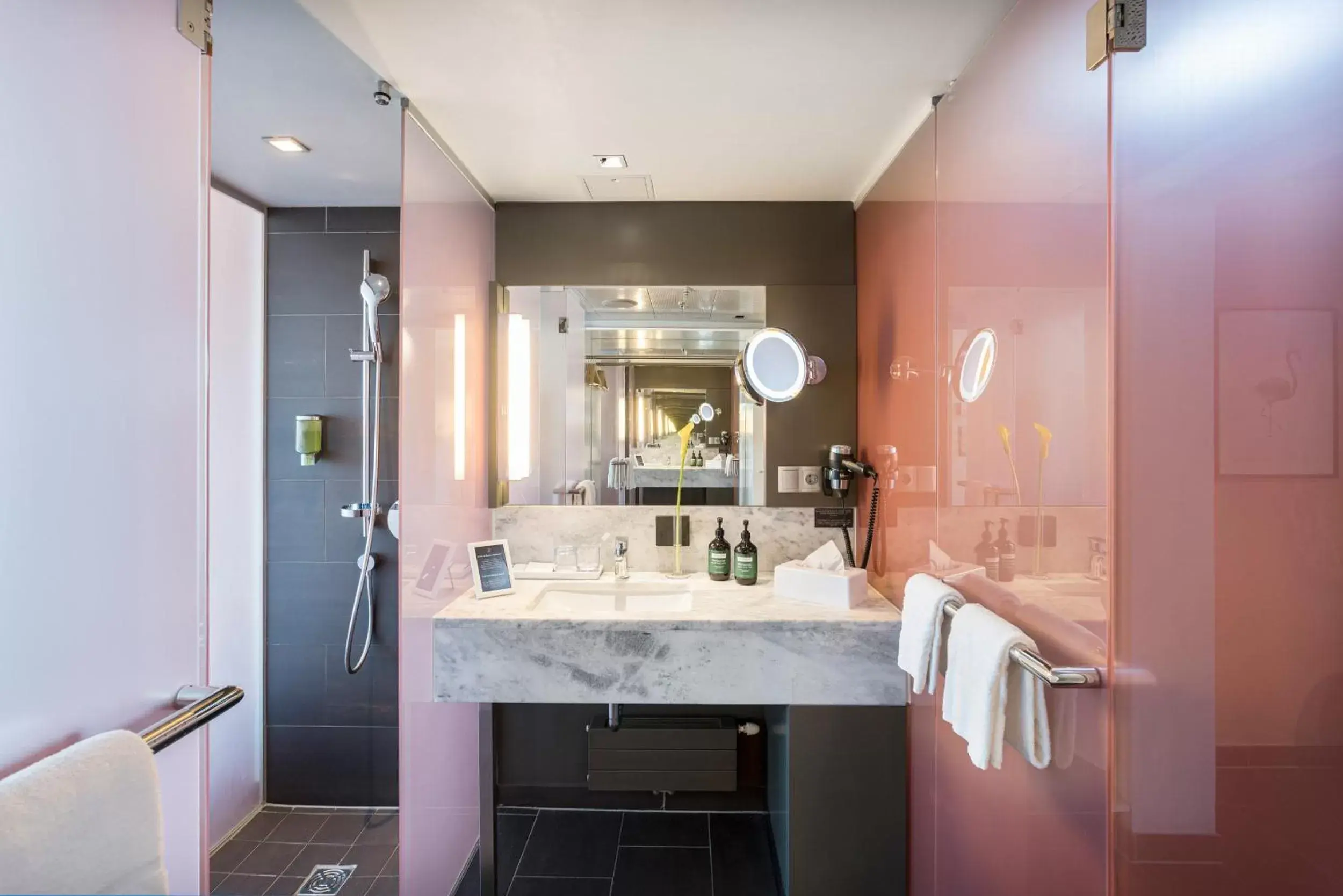 Bathroom in voco® Villach, an IHG Hotel