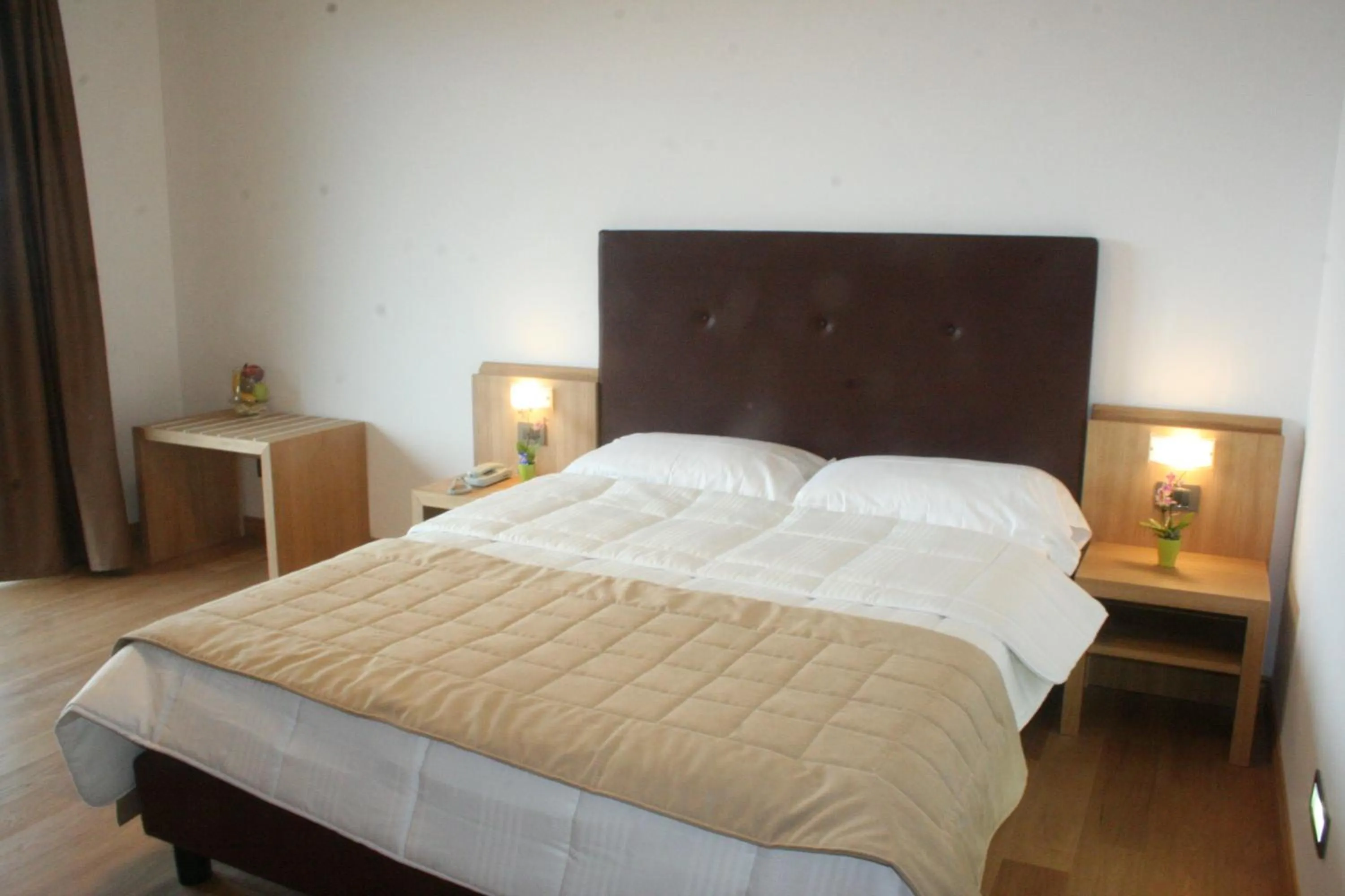 Bed in Villa Eva Hotel