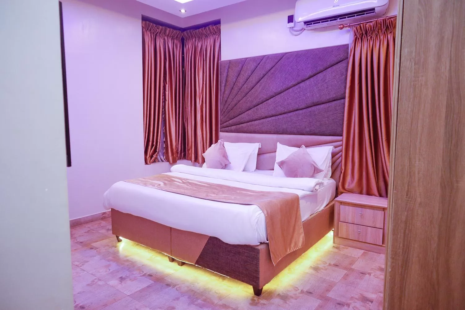 Property building, Bed in God's Touch Apartments Signature