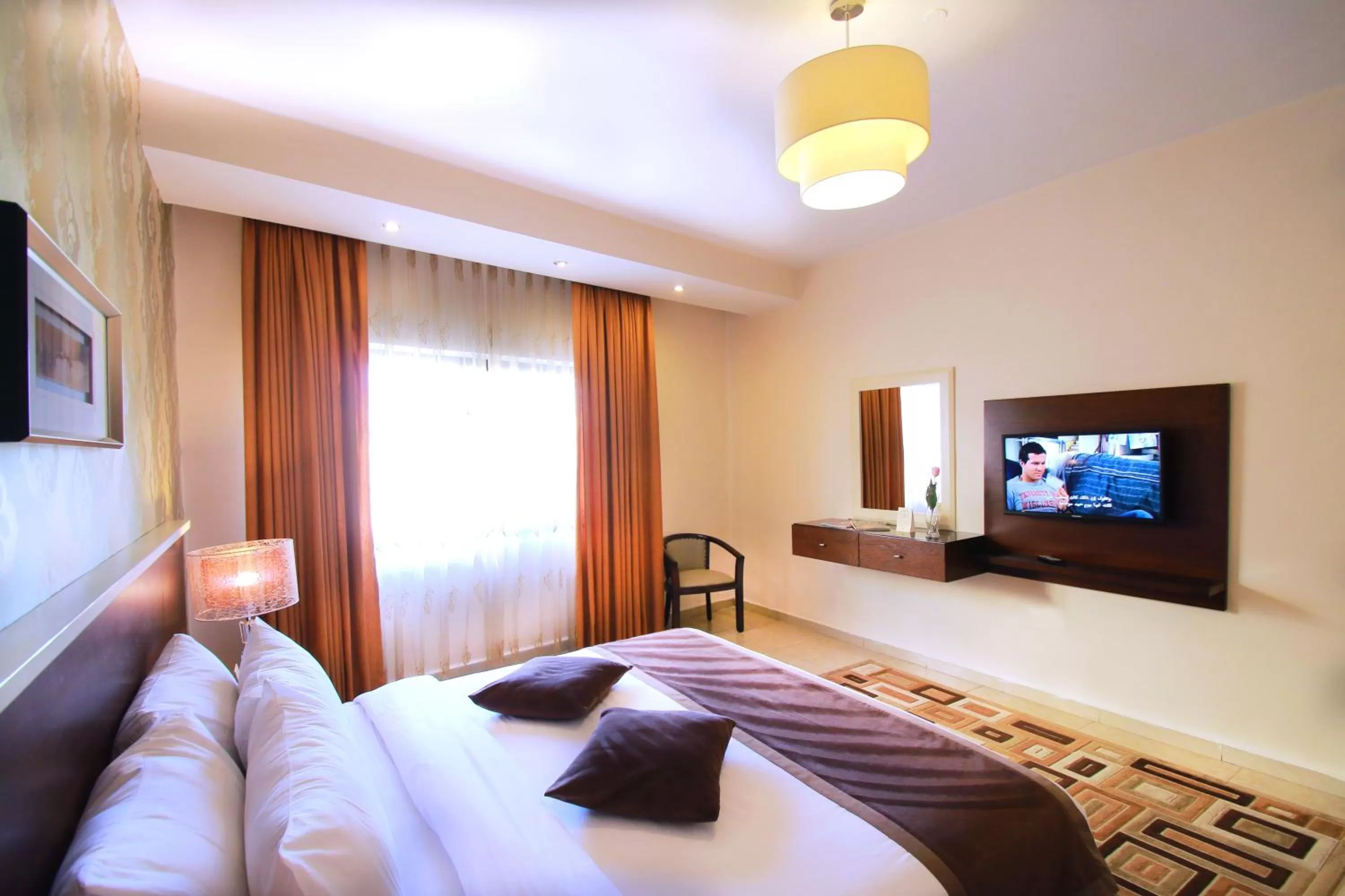 Bed in City Rose Hotel Suites