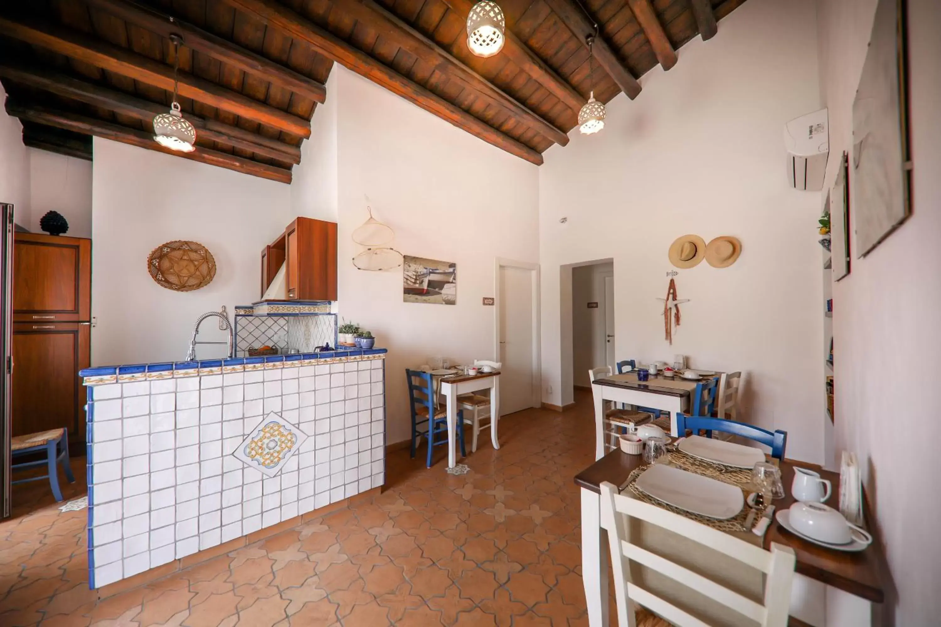 Living room, Kitchen/Kitchenette in Agrodolce B&B