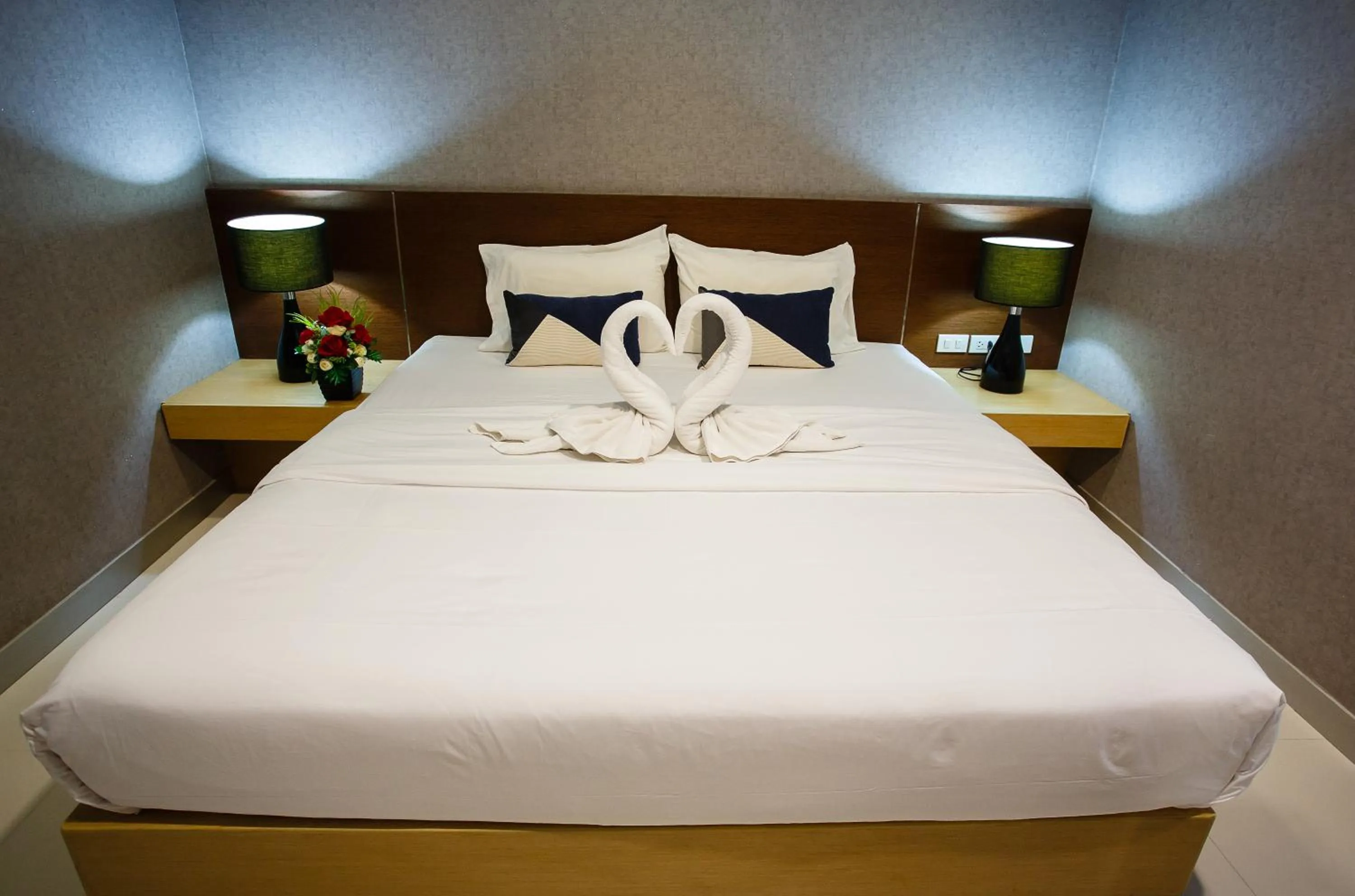 Bed in Platinum Hotel and Apartments