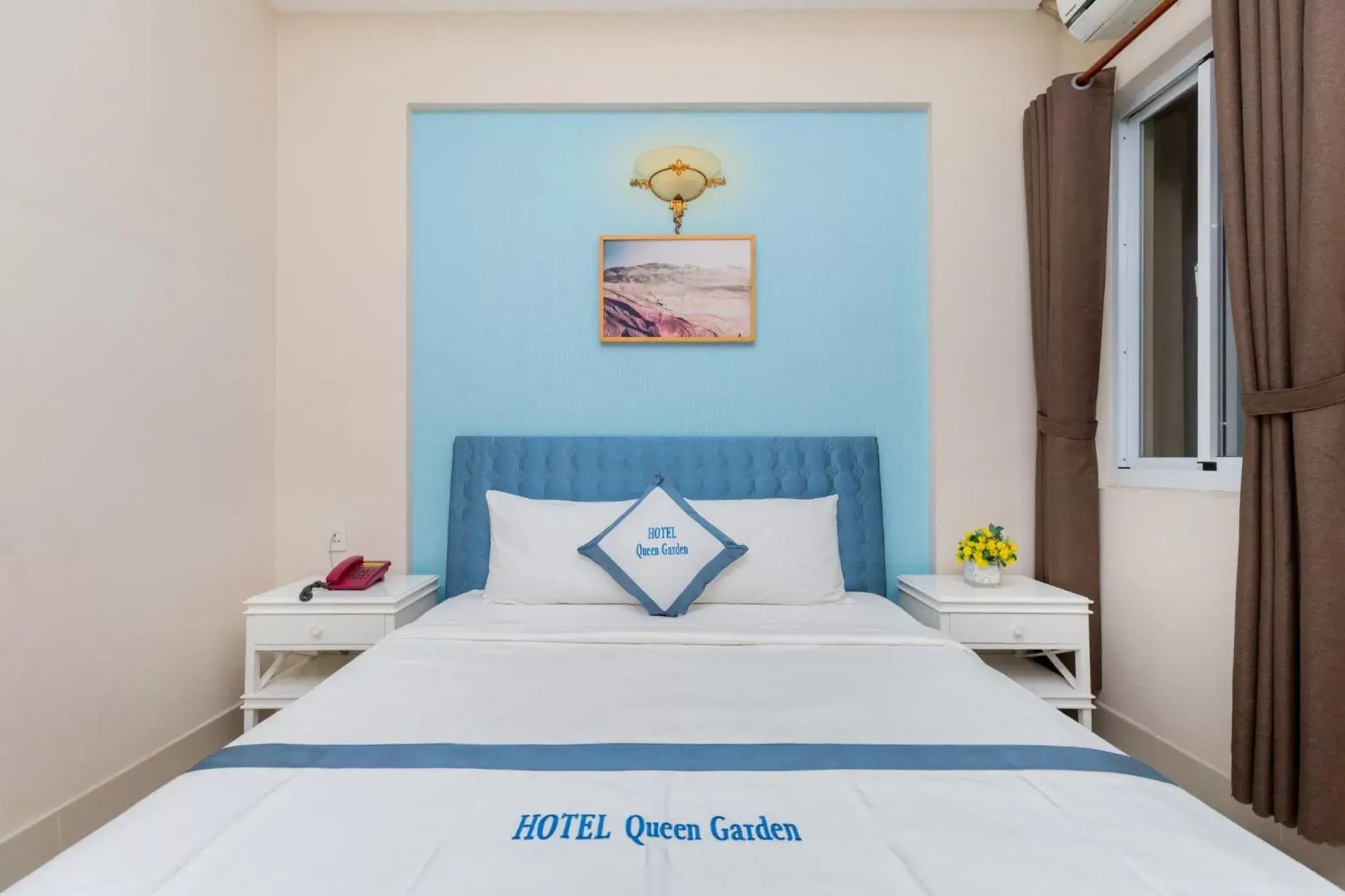 Bed in Queen Garden Hotel & Apartment