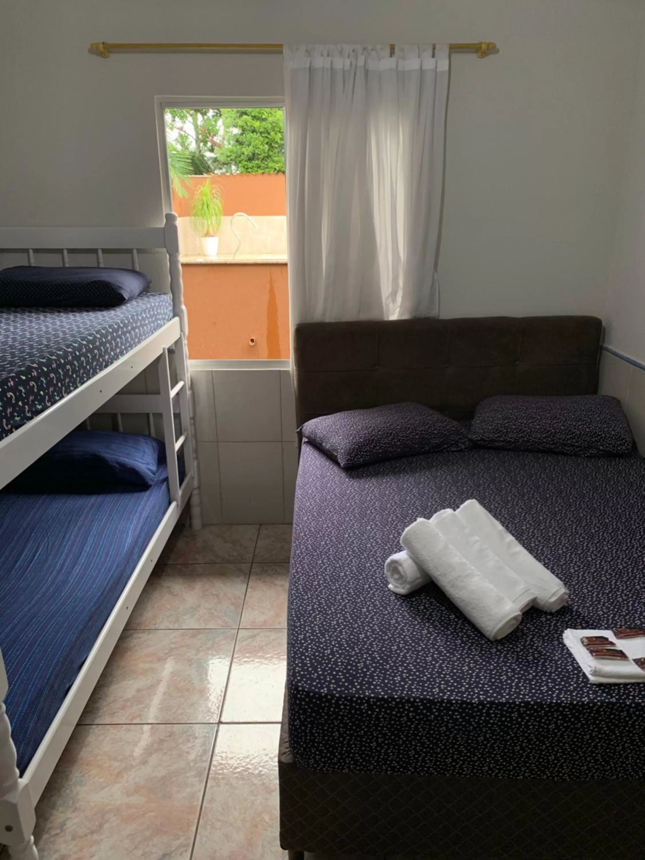 Bed in Pousada Tio Tonho