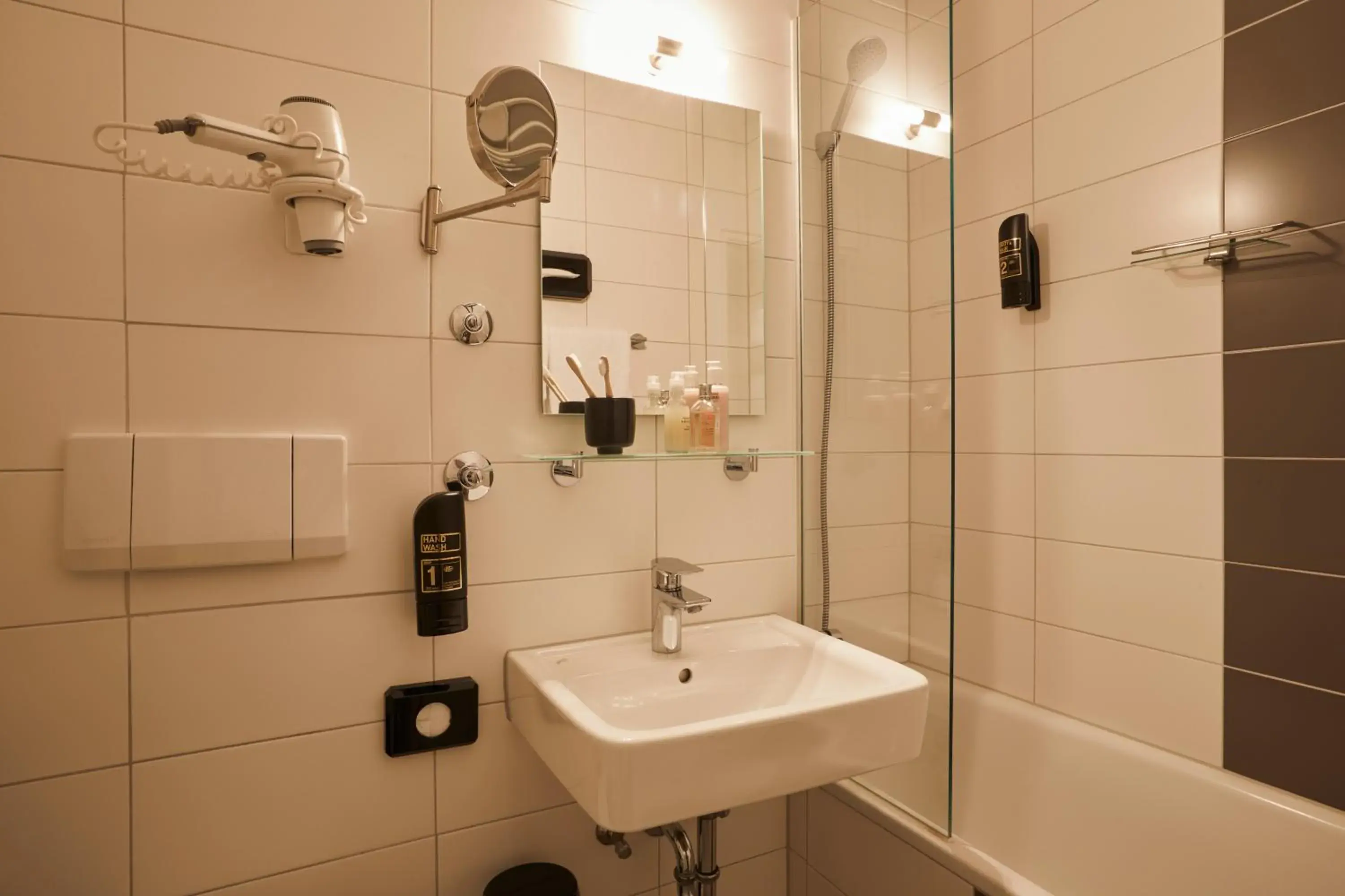 Bathroom in Hotel Mirabell by Maier Privathotels