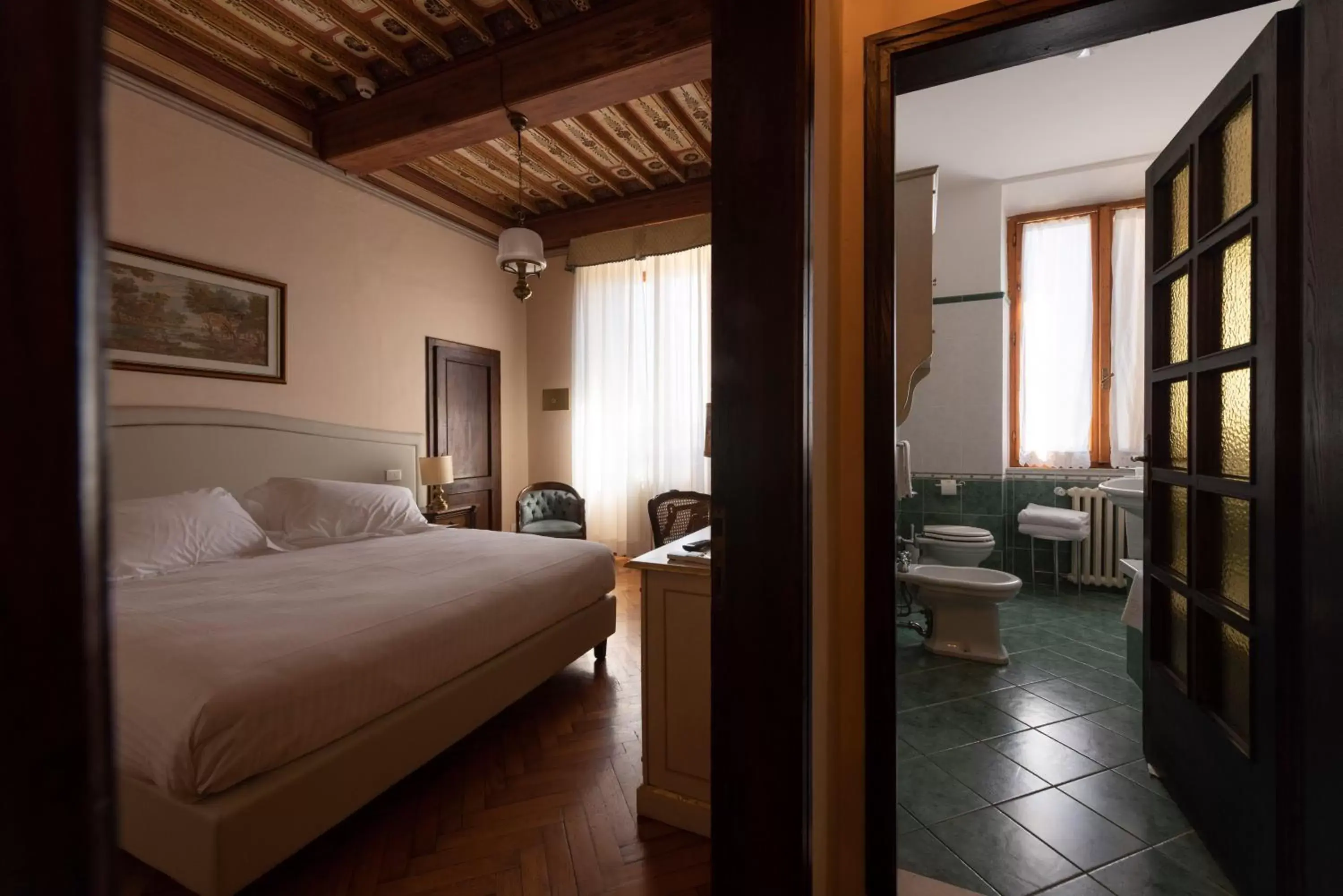 Bed in Villa Scacciapensieri Boutique Hotel