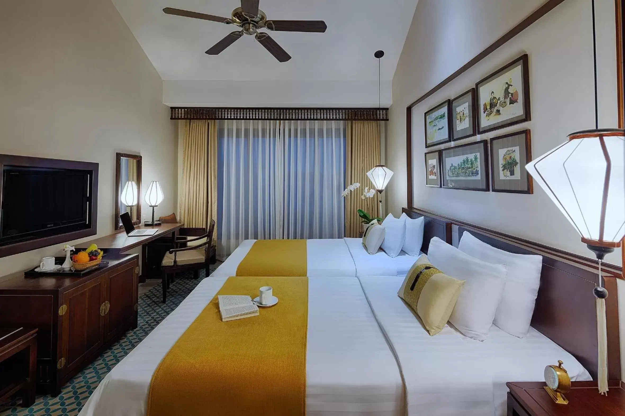 Bed, TV/Entertainment Center in Little Hoi An . A Boutique Hotel & Spa