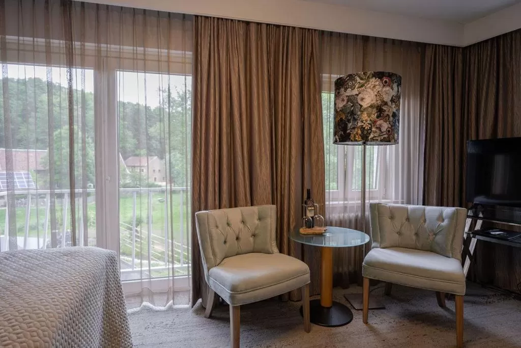 Bed in Boutique Hotel Slenaker Vallei - Buitengewoongenieten