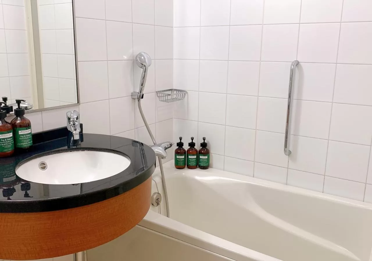 Bathroom in ANA Crowne Plaza Okayama by IHG